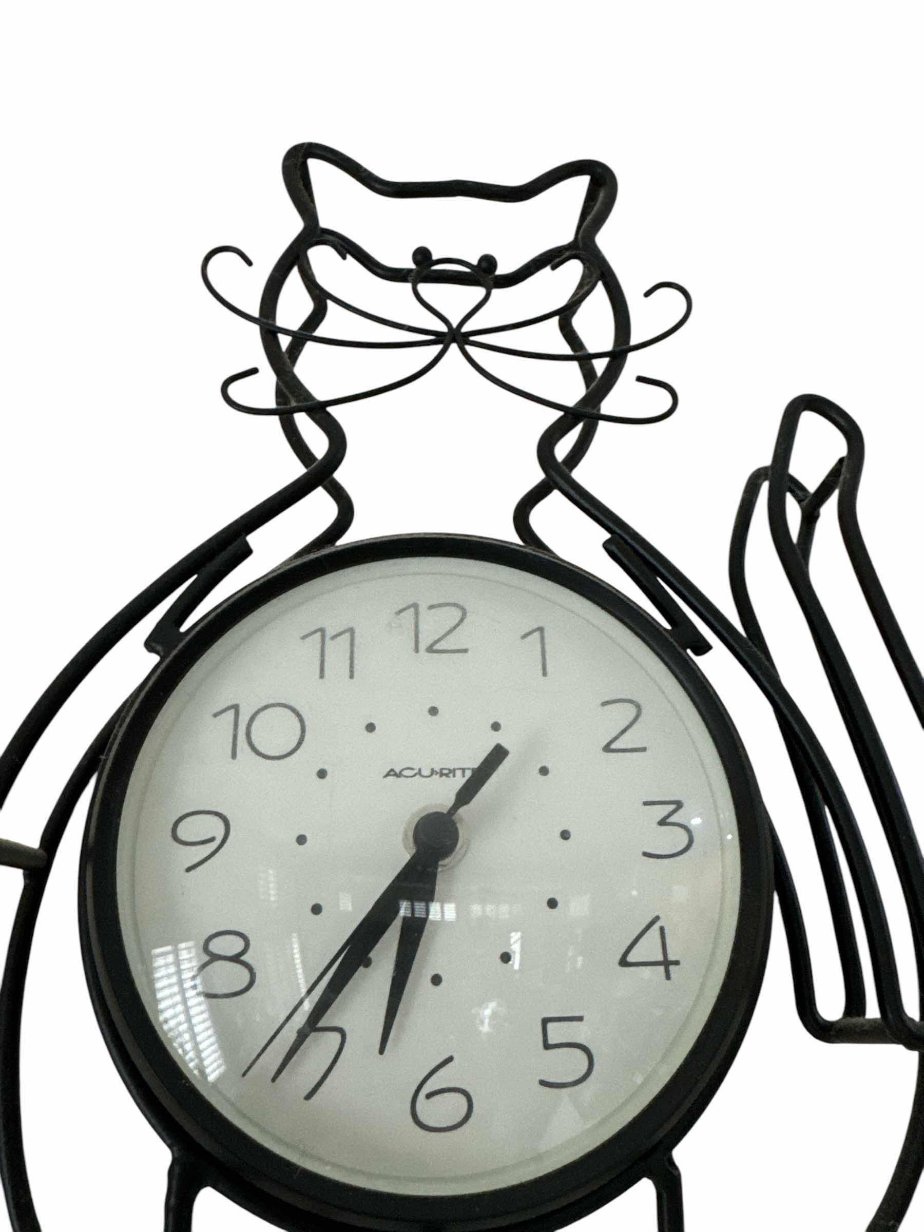 Photo 1 of 13” X 8” BLACK CAT WALL CLOCK