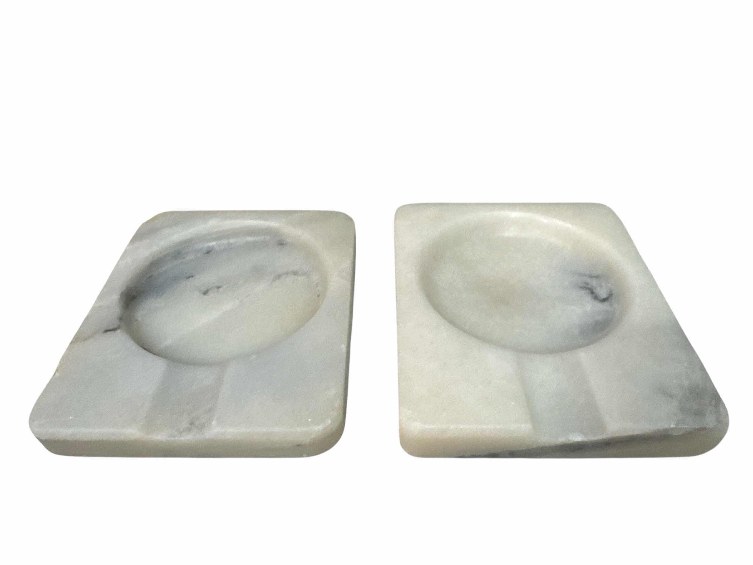 Photo 1 of 5 PIECE MARBLE SET 18” X 12” MARBLE CUTTING BOARD, (2) MARBLE SPOON RESTS AND (1) LIDDED MARBLE CONTAINER (1) PAPER TOWEL HOLDER