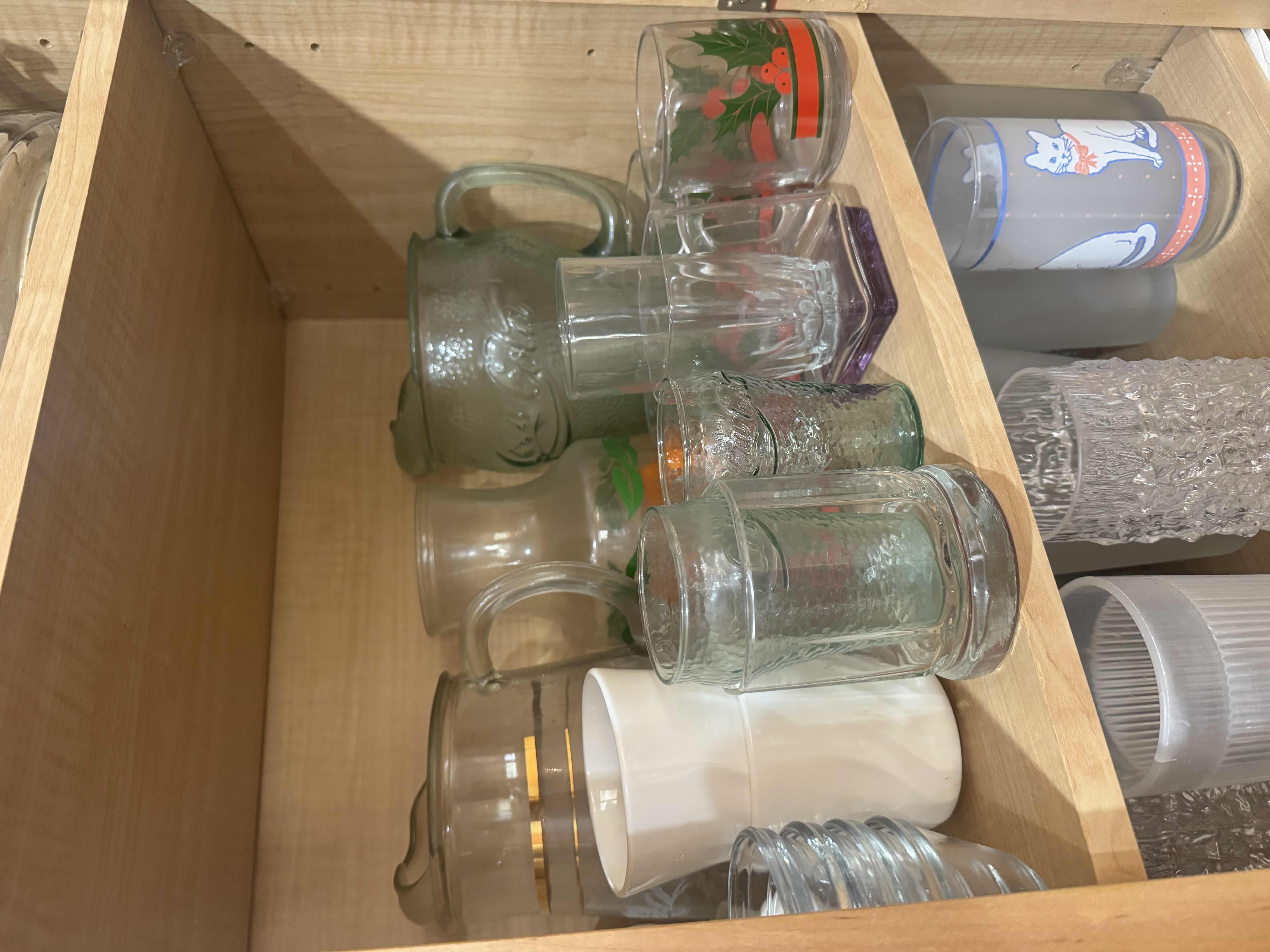 Photo 1 of CONTENTS OF CABINET- ASSORTED DRINK WARE, PITCHERS & BOWLS