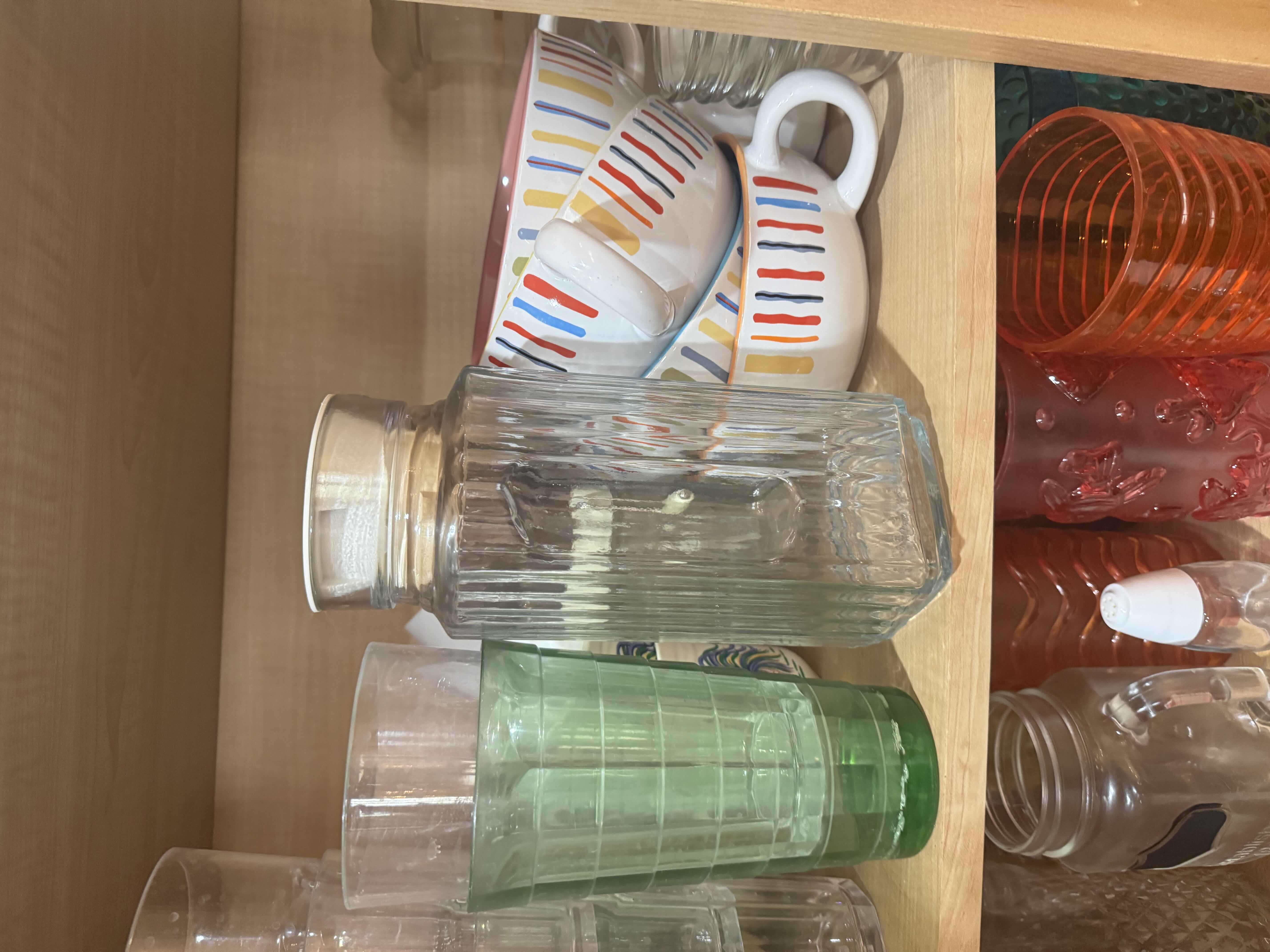 Photo 1 of CONTENTS OF CABINET- ASSORTED DRINK WARE, PITCHERS & BOWLS