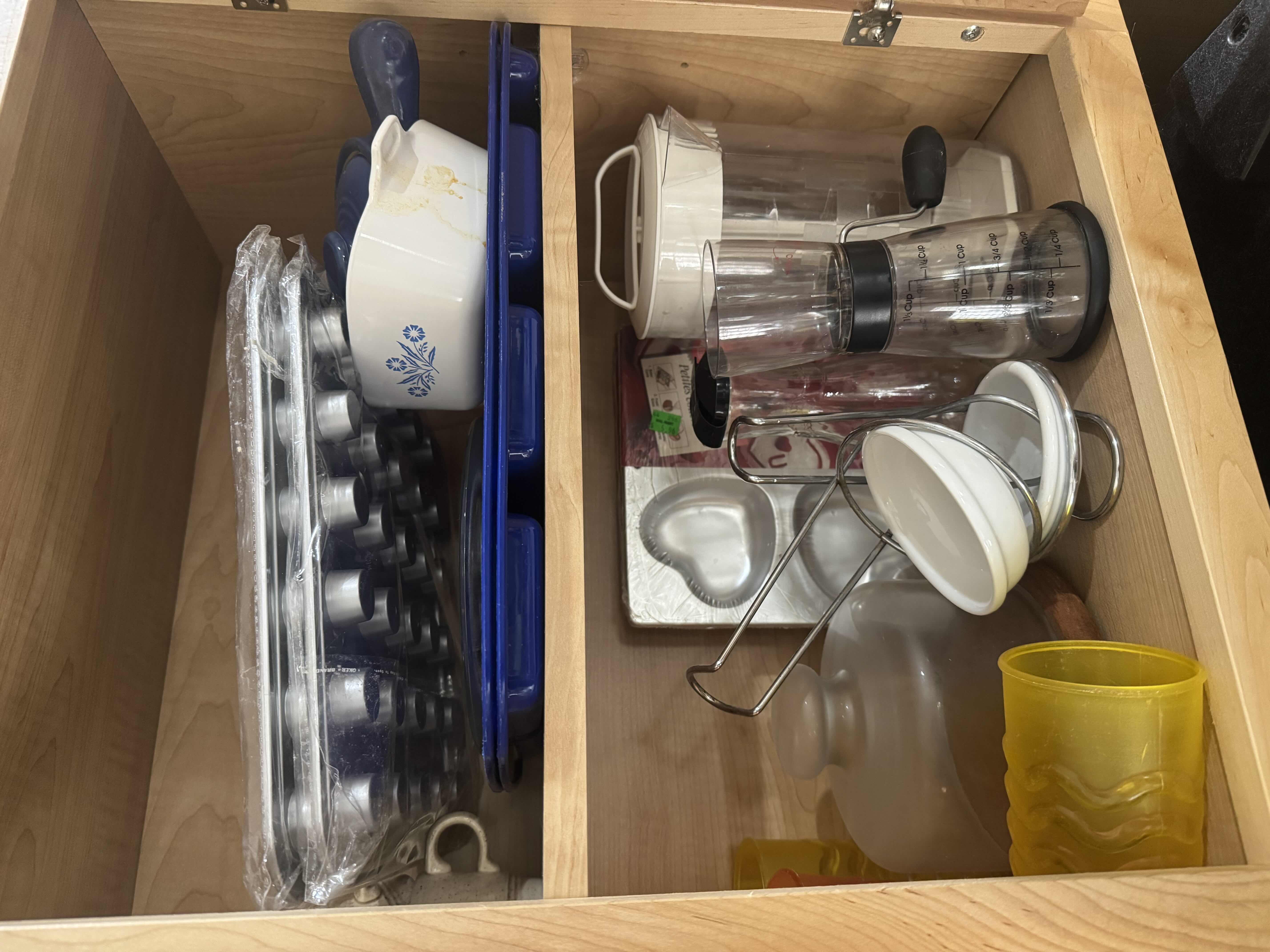 Photo 1 of CONTENTS OF CABINET- MOLDS, PITCHERS, CUPS, CARAFE, PLATTERS