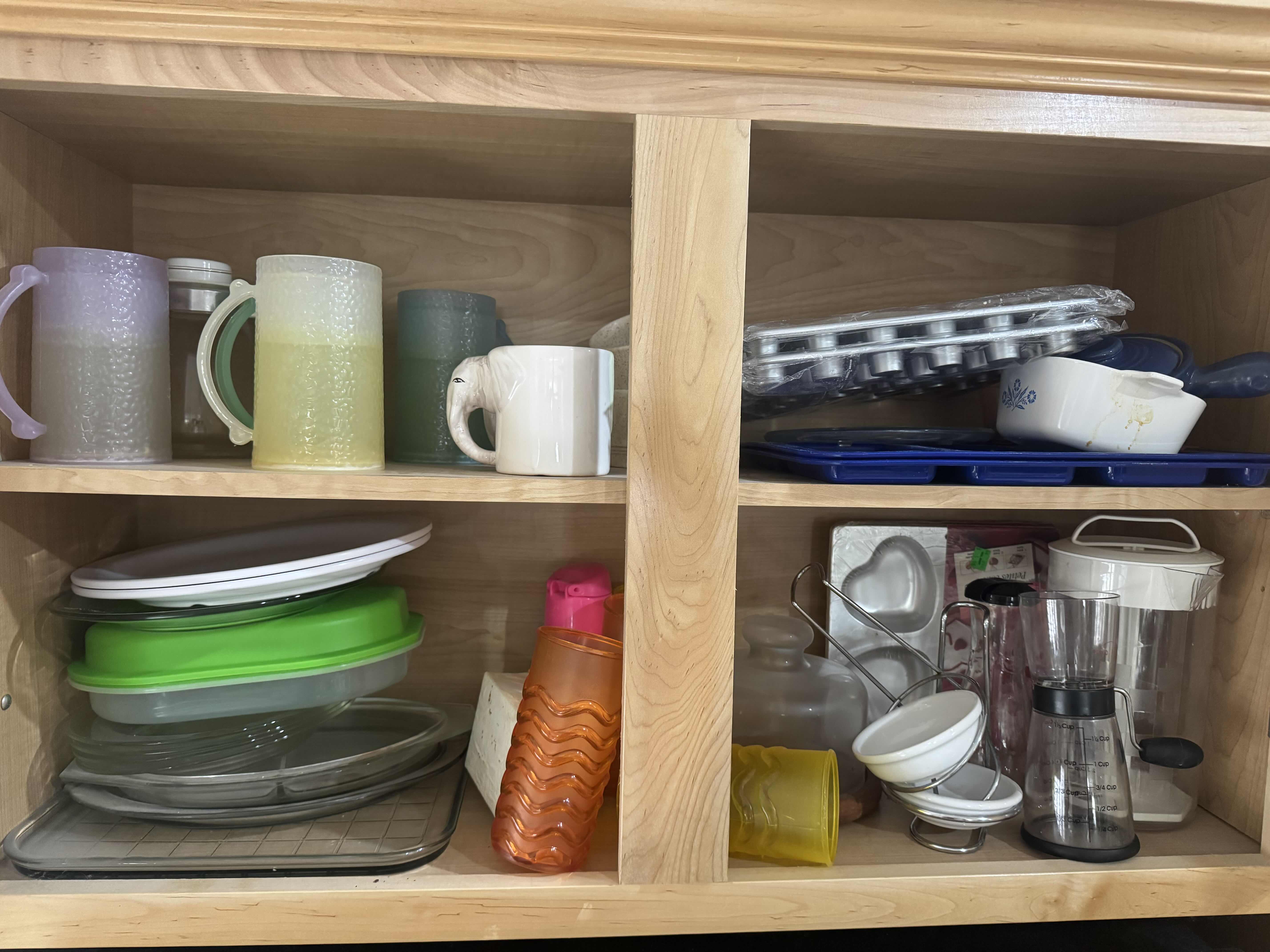 Photo 1 of CONTENTS OF CABINET- MOLDS, PITCHERS, CUPS, CARAFE, PLATTERS