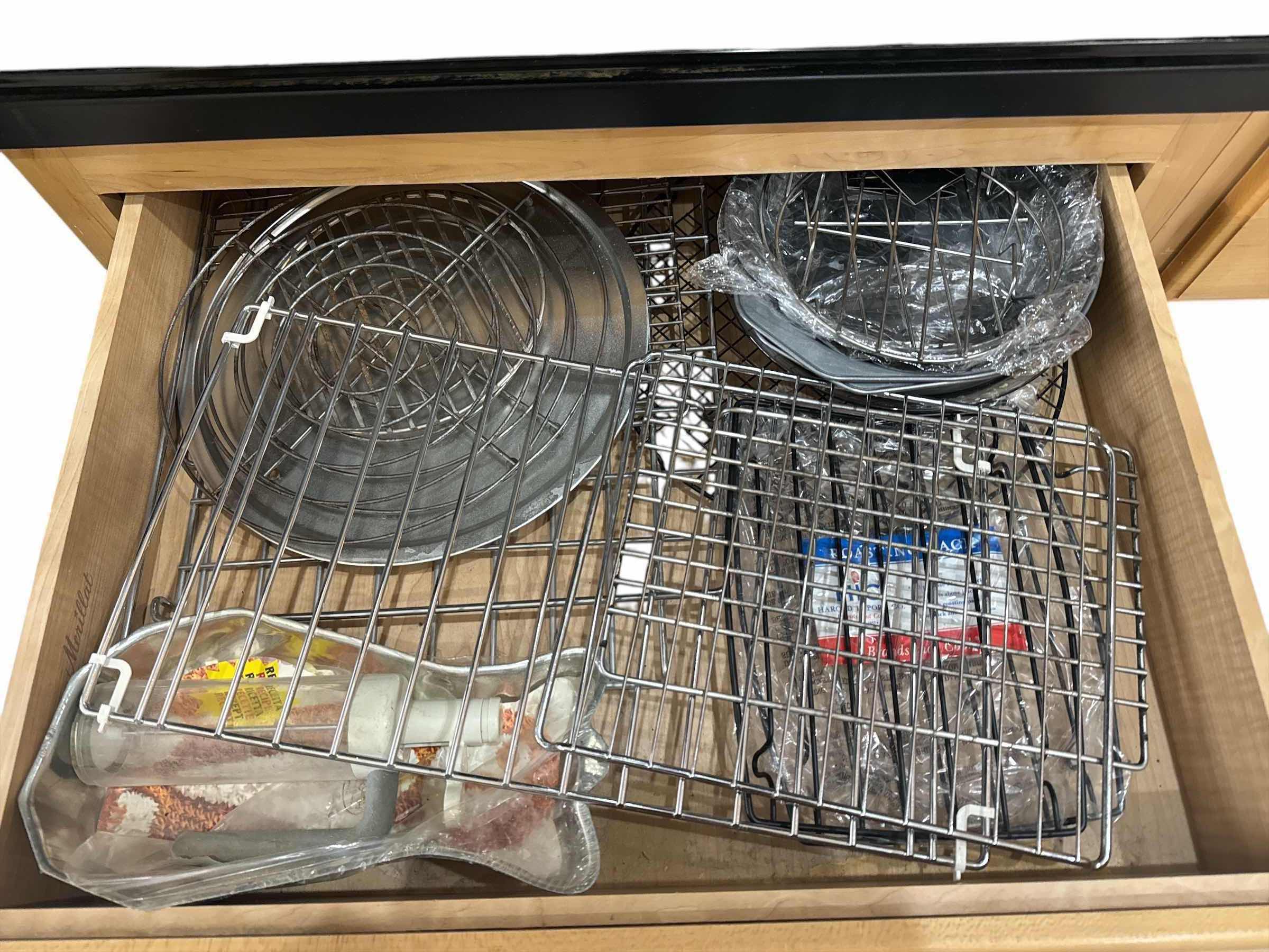 Photo 1 of CONTENTS OF DRAWER- CAKE PANS, PIE PAN, WIRE RACKS
