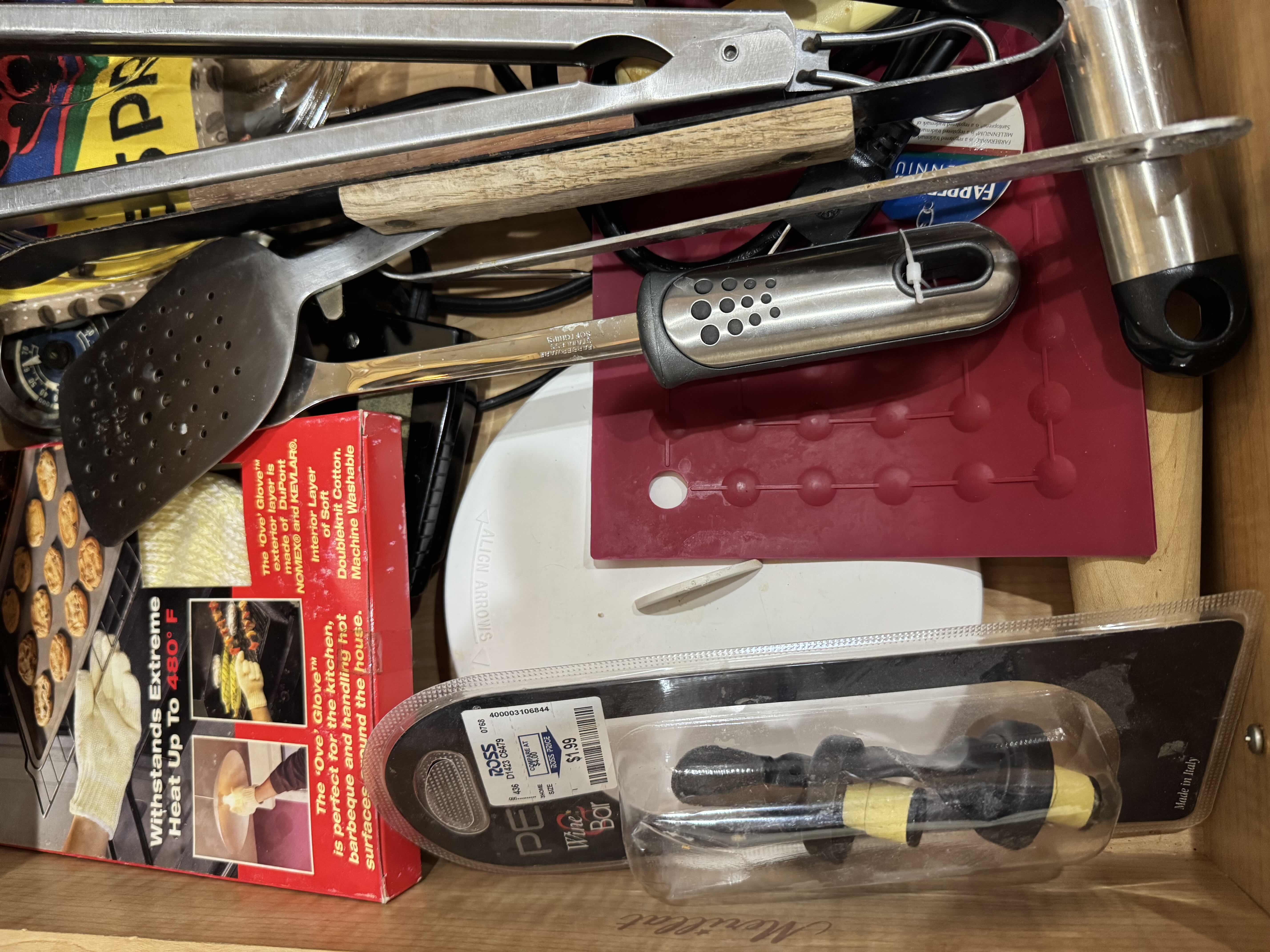 Photo 1 of CONTENTS OF DRAWER-UTENSILS HOT MATS, OVEN GLOVES