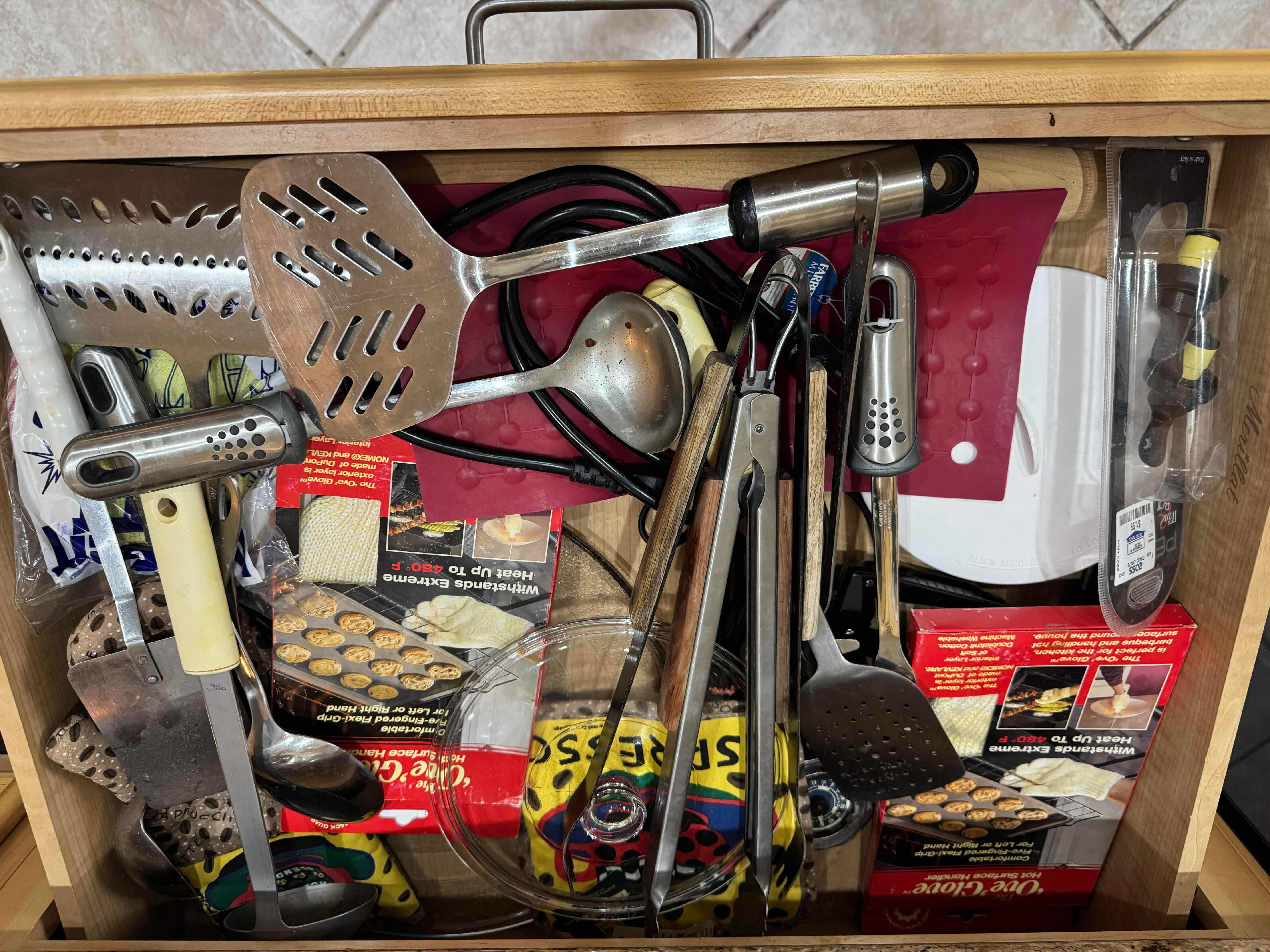 Photo 1 of CONTENTS OF DRAWER-UTENSILS HOT MATS, OVEN GLOVES