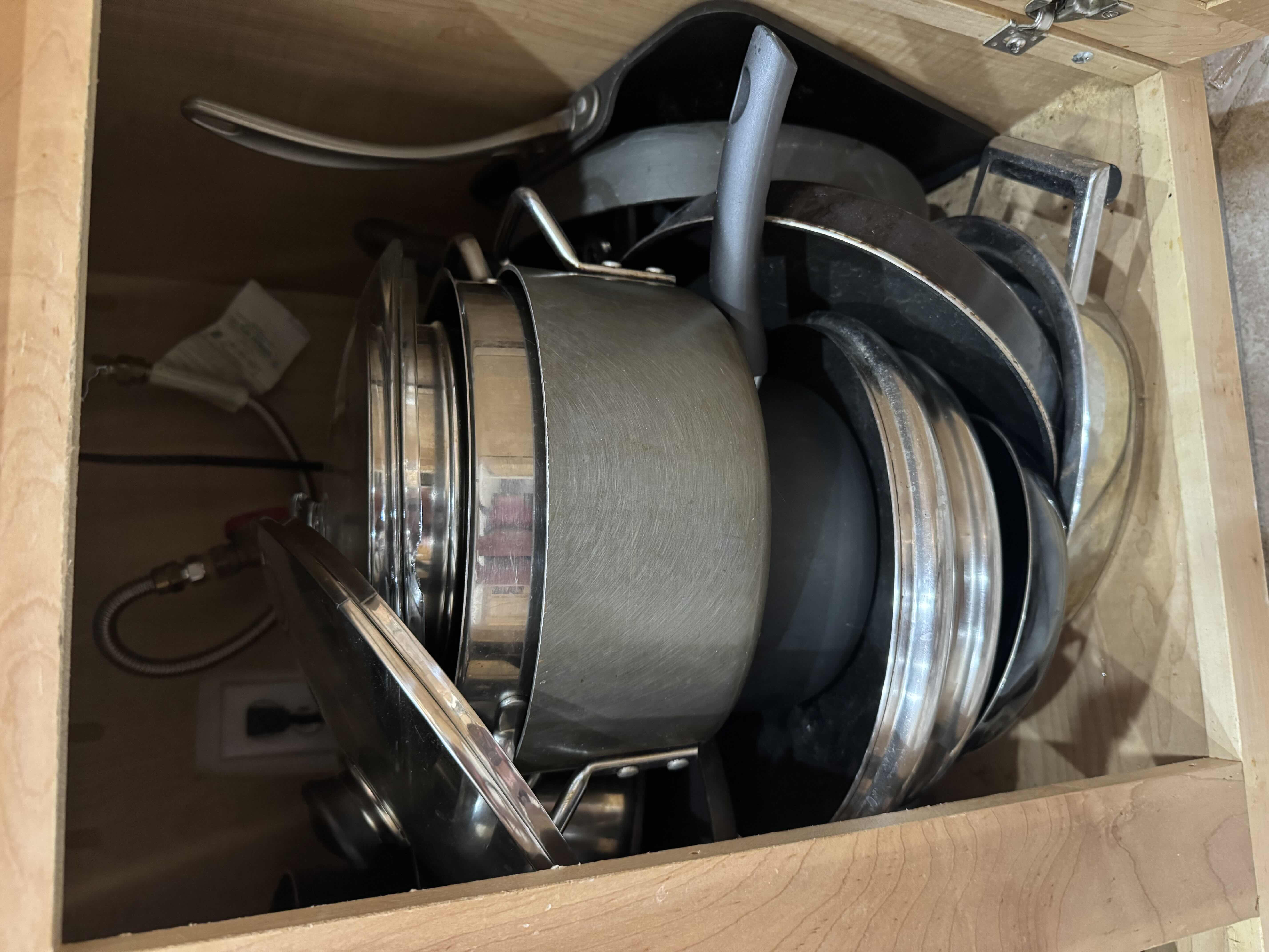 Photo 1 of CONTENTS OF CABINET- POTS & PANS