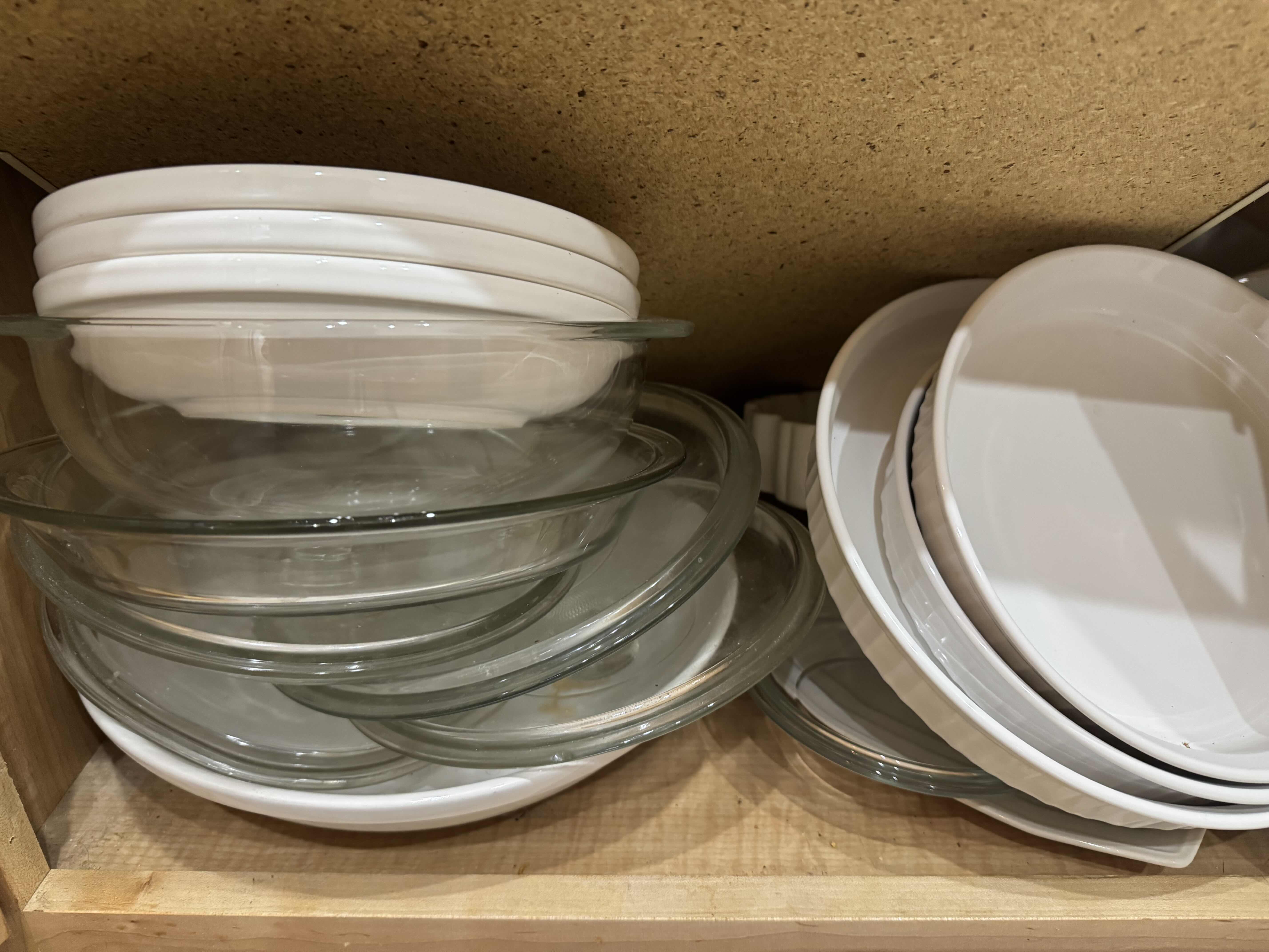 Photo 1 of CONTENTS OF LEFT CABINET - SOUP BOWLS, SERVING BOWLS, PIE PLATE