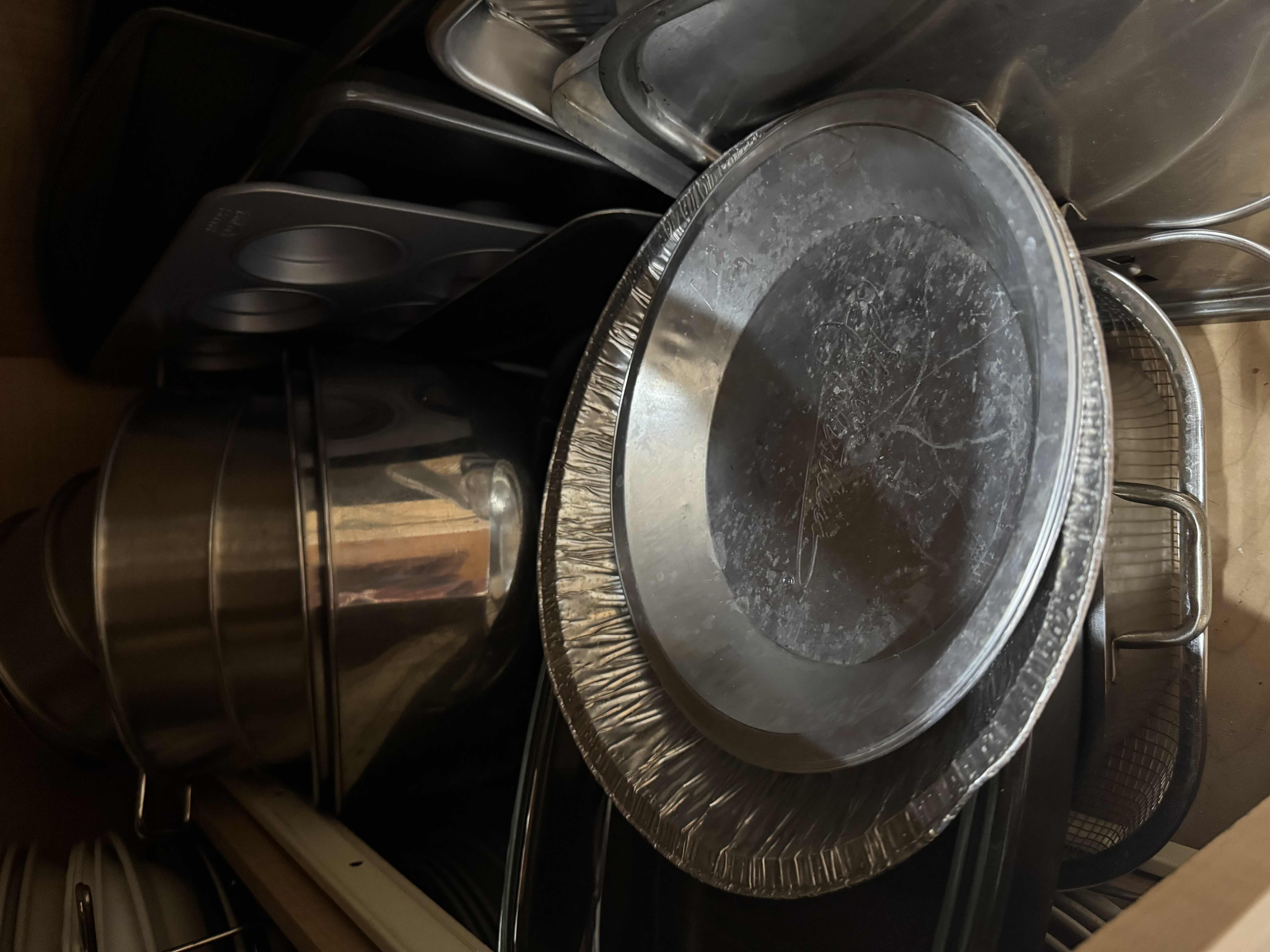 Photo 1 of CONTENTS OF CABINET-PANS, COOKIE SHEETS, STOCK POTS