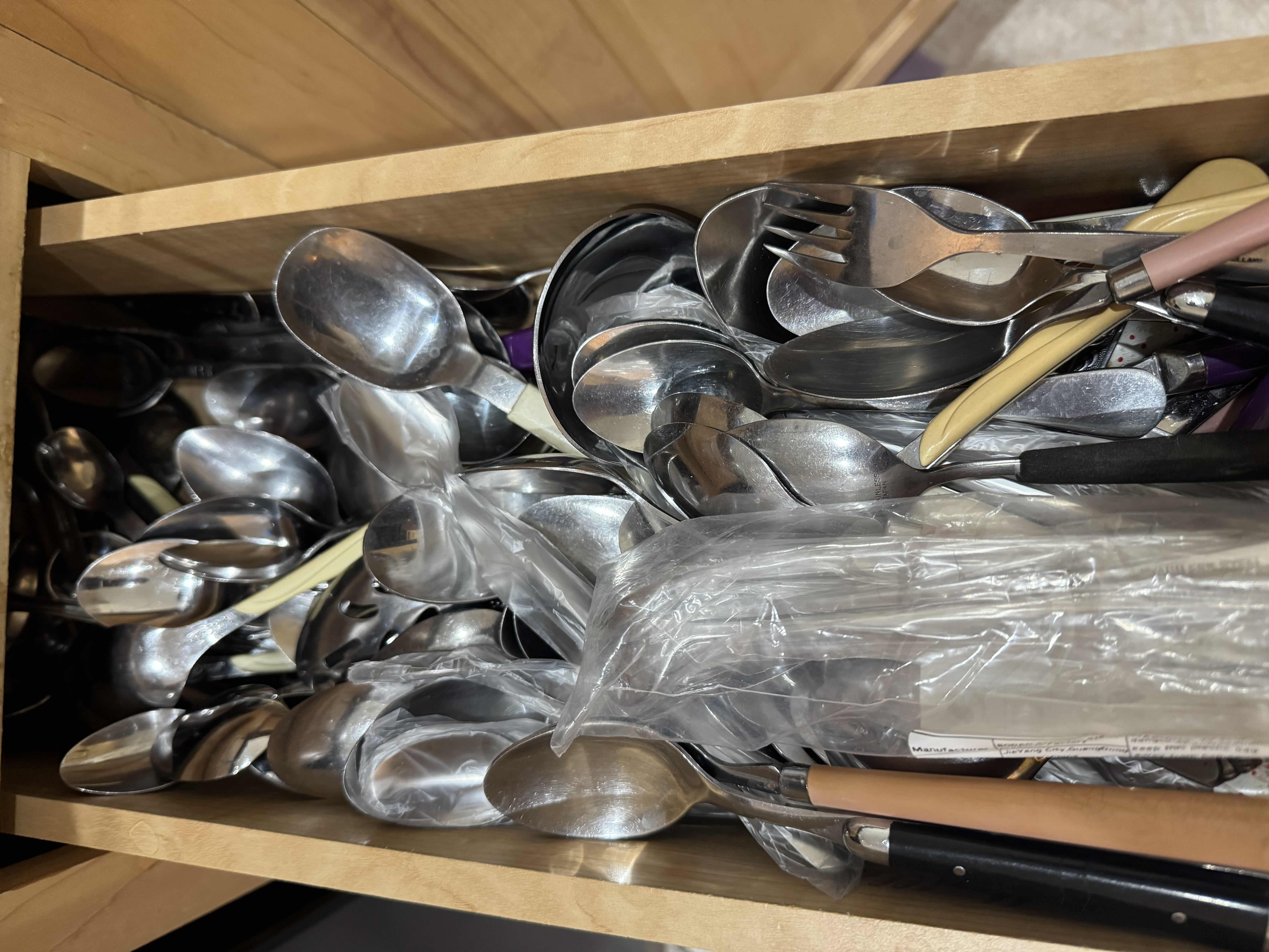 Photo 1 of CONTENTS OF DRAWER-SPOONS