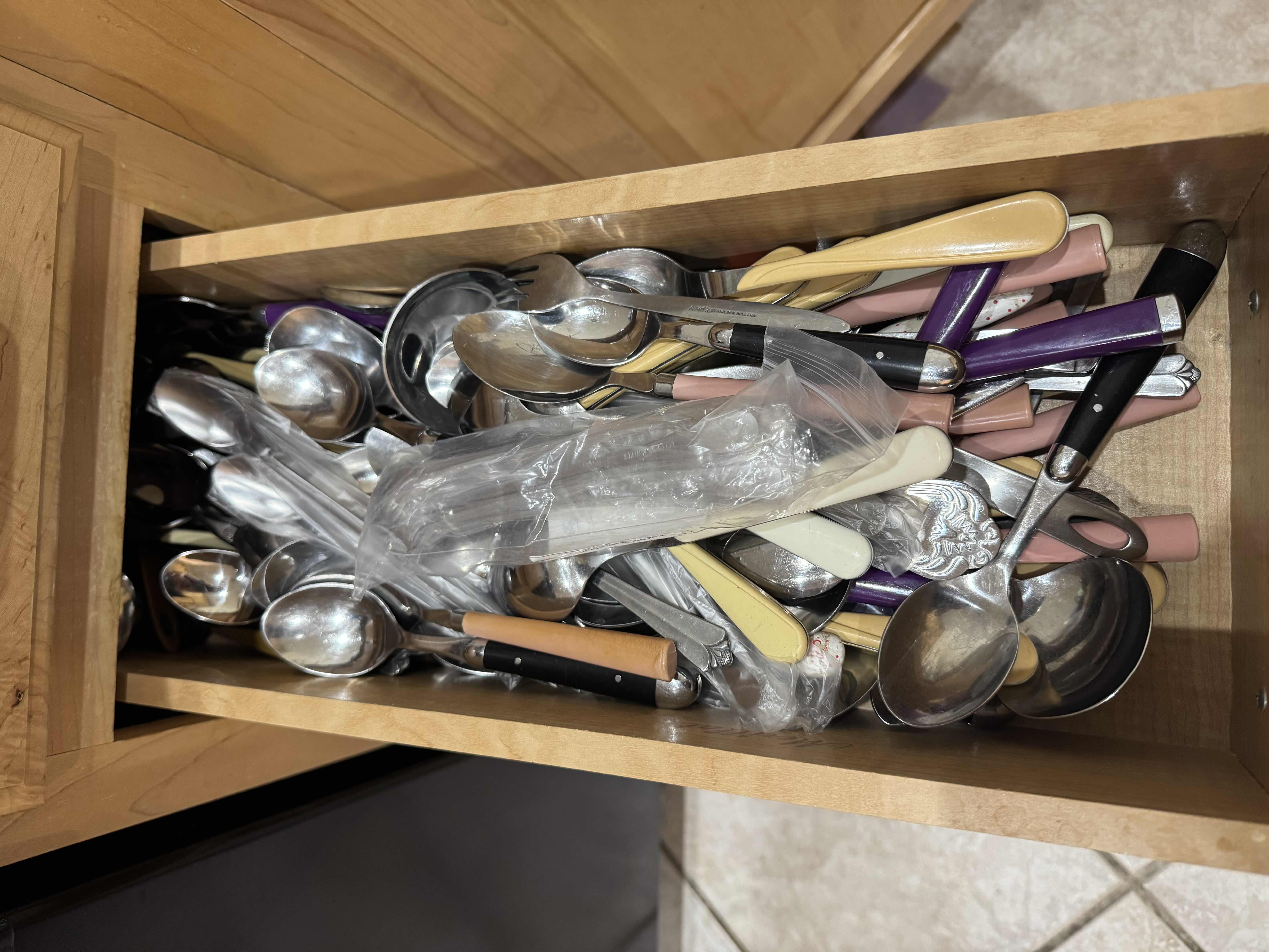 Photo 1 of CONTENTS OF DRAWER-SPOONS