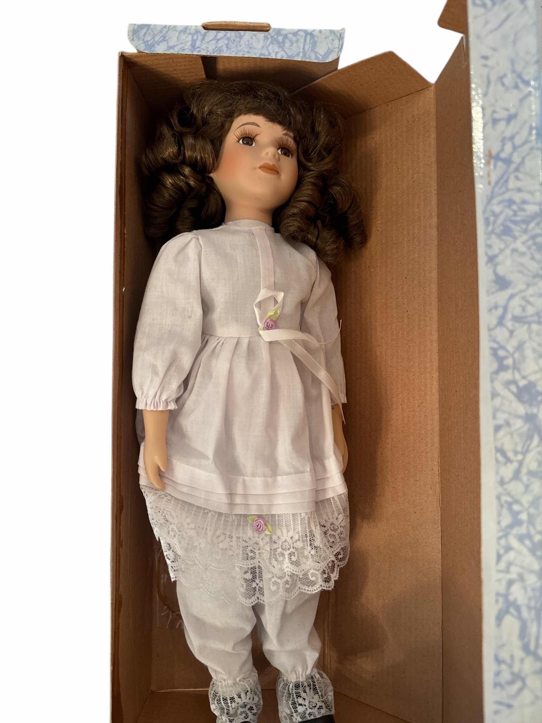 Photo 1 of BRAND NEW CACHE JUNCTION PORCELAIN DOLL “BROWN MEGHAN”