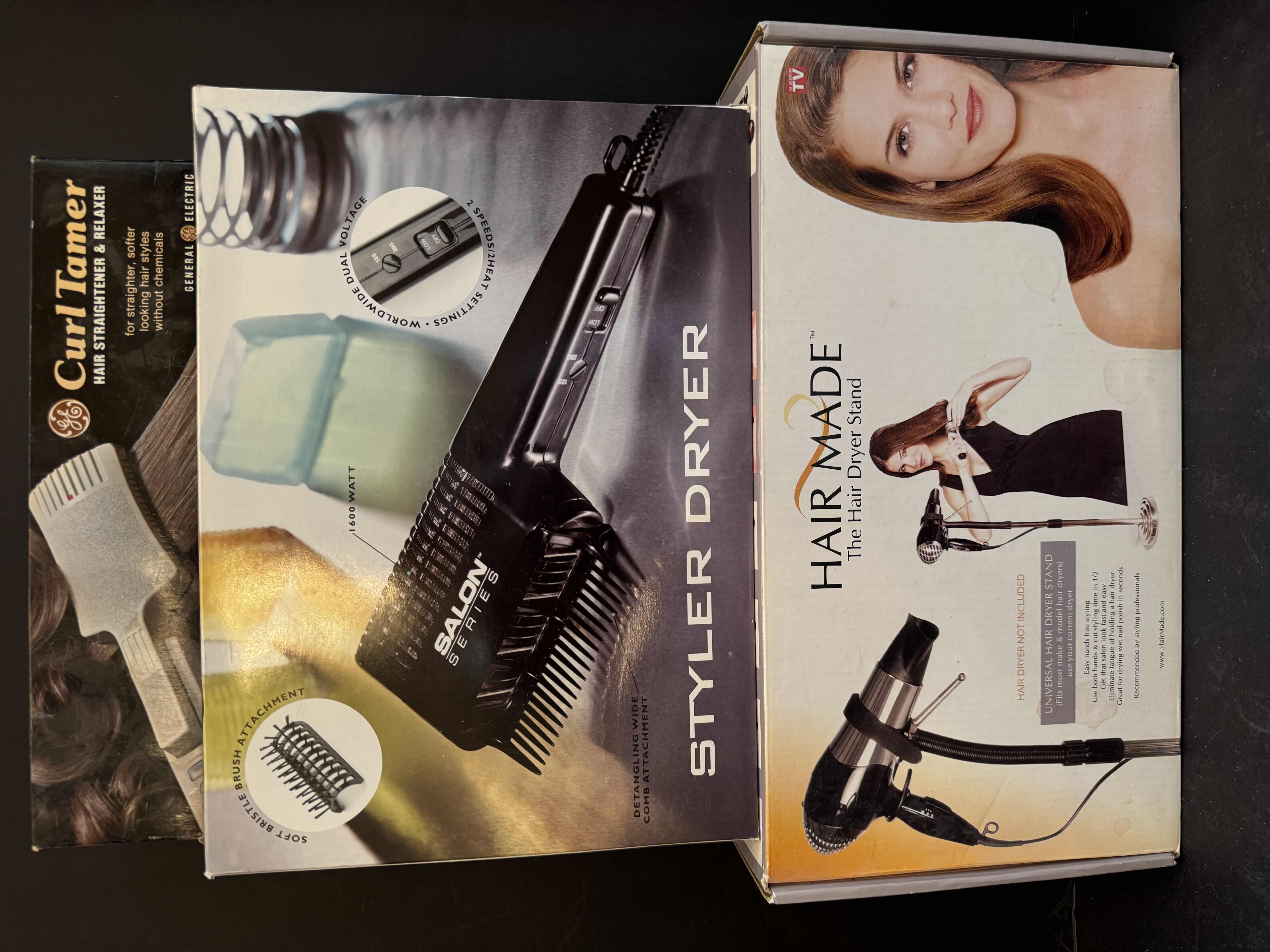 Photo 1 of ASSORTED HAIRSTYLING TOOLS, HAIR STRAIGHTENER, BLOW DRYER, BLOW DRYER STAND, HAIR CURLING WAND, AND STYLER DRYER, 5 ITEMS