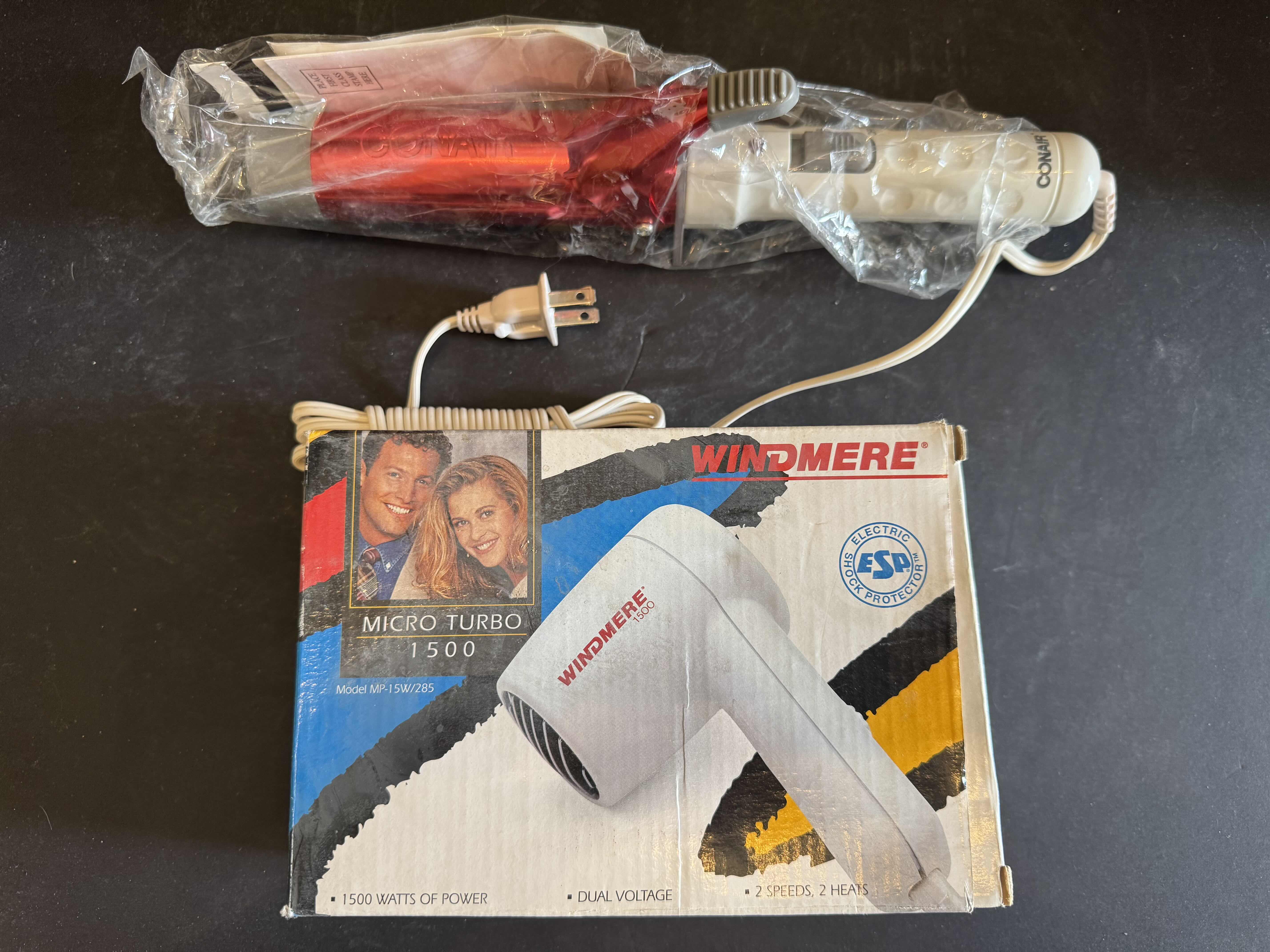 Photo 1 of ASSORTED HAIRSTYLING TOOLS, HAIR STRAIGHTENER, BLOW DRYER, BLOW DRYER STAND, HAIR CURLING WAND, AND STYLER DRYER, 5 ITEMS