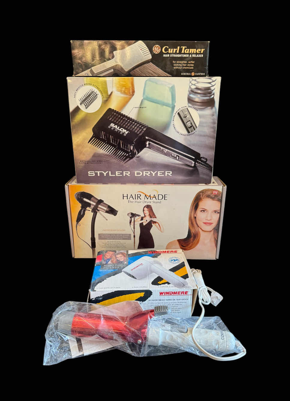 Photo 1 of ASSORTED HAIRSTYLING TOOLS, HAIR STRAIGHTENER, BLOW DRYER, BLOW DRYER STAND, HAIR CURLING WAND, AND STYLER DRYER, 5 ITEMS
