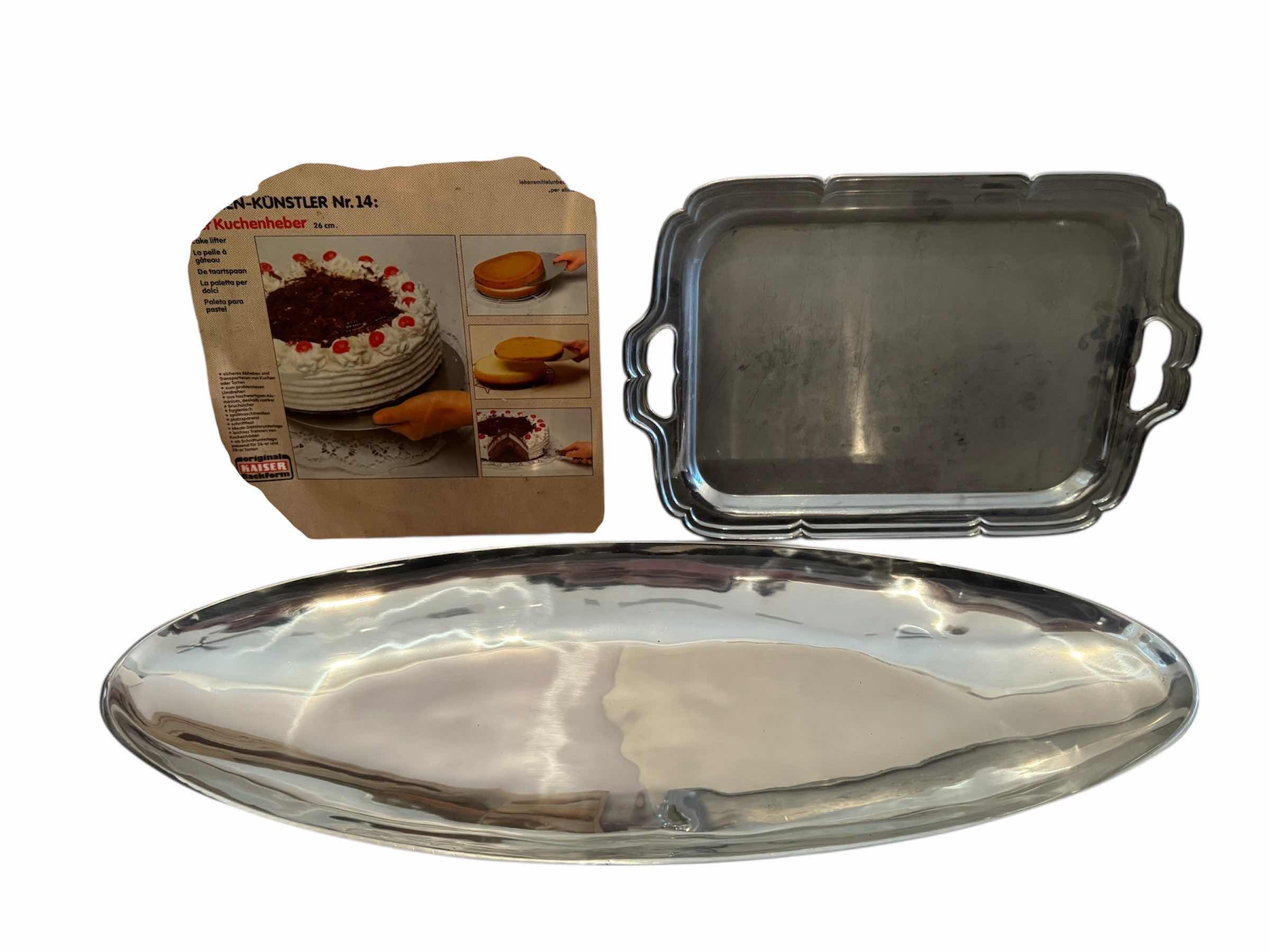 Photo 1 of 68
3- VINTAGE SILVER SERVING PLATTERS AND CAKE TRANSFER PLATE 

L26” AND SMALLER