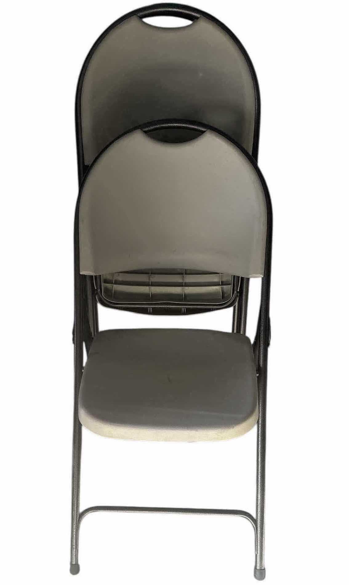 Photo 1 of FOUR PLASTIC FOLDING CHAIRS GRAY