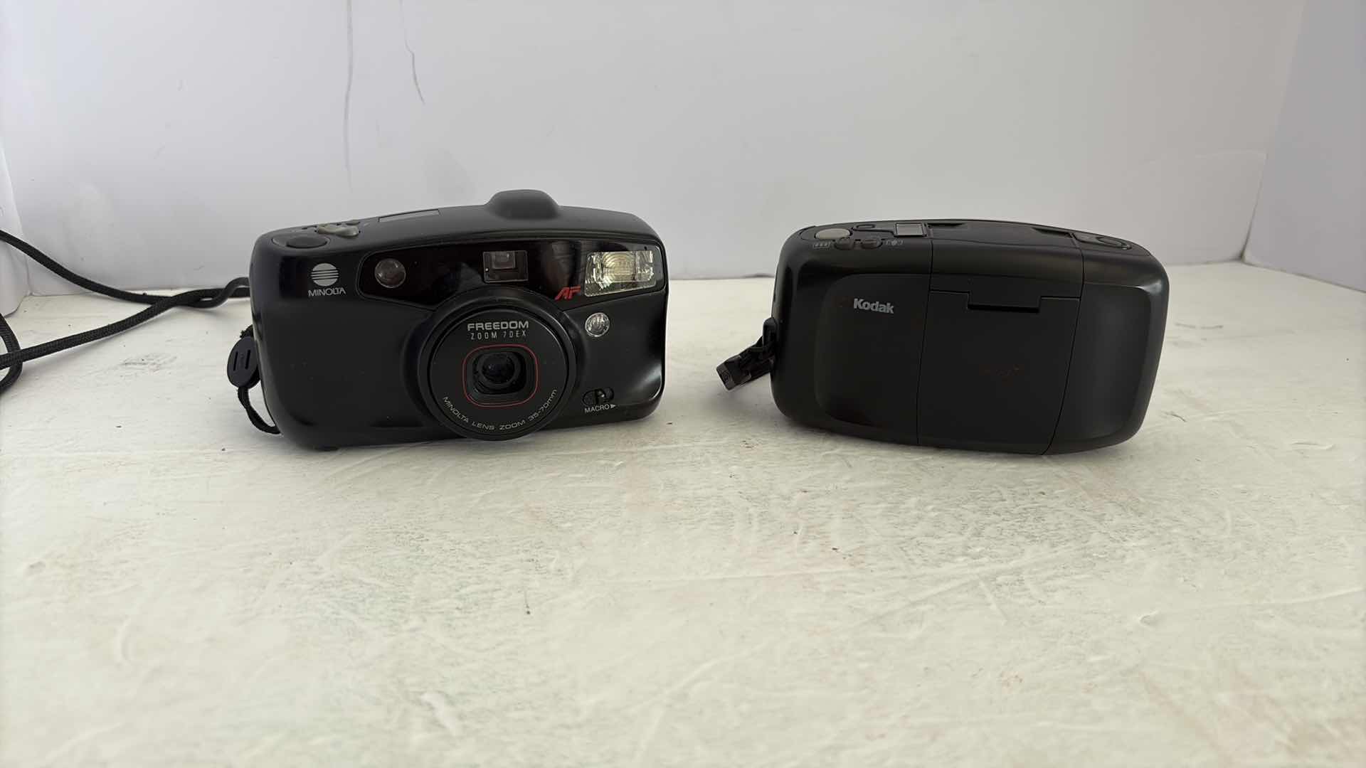 Photo 1 of TWO FILM CAMERAS KODAK AND MINOLTA