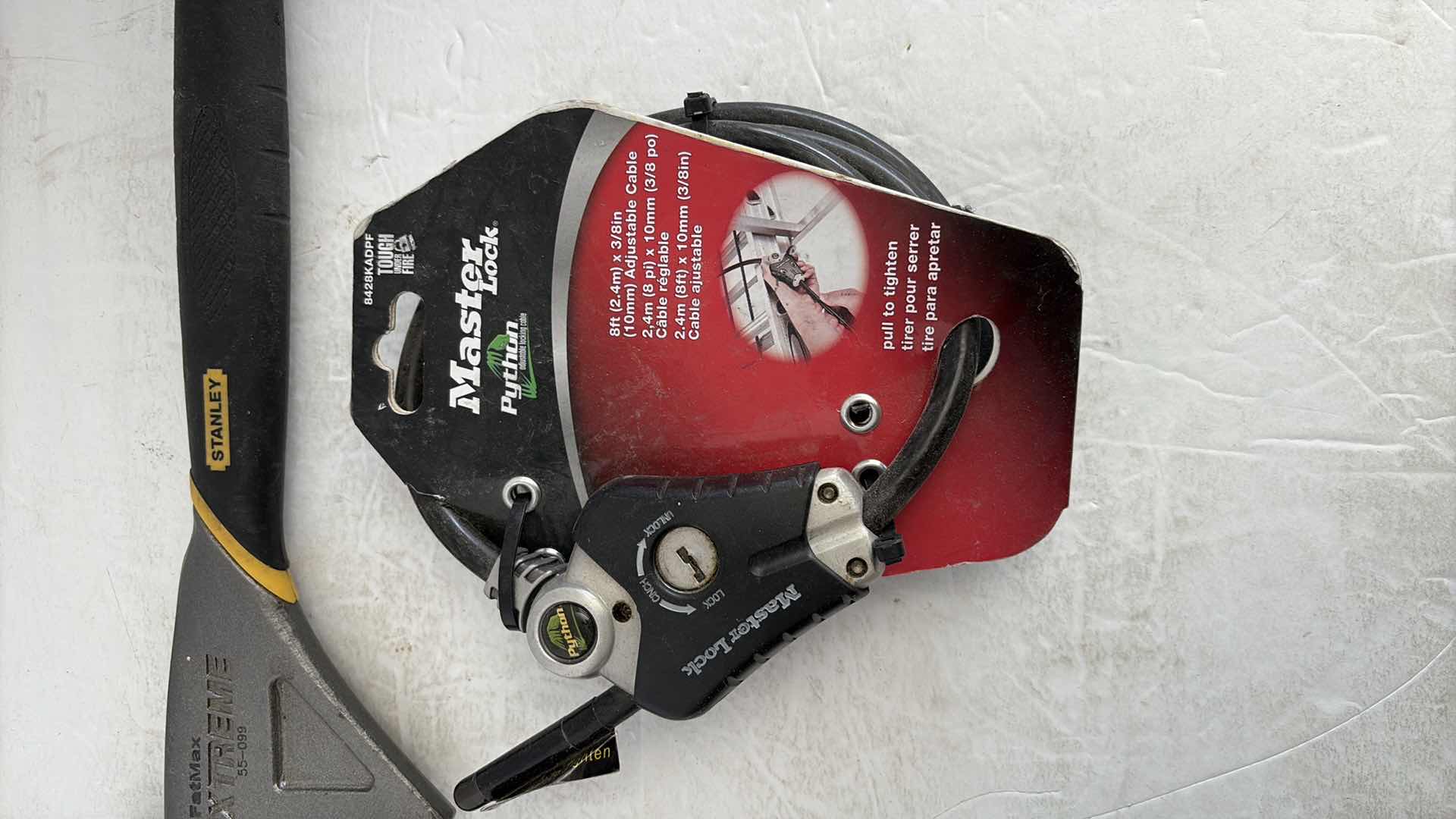 Photo 1 of MASTERLOCK PYTHON LOCK AND STANLEY FATMAX EXTREME CROWBAR