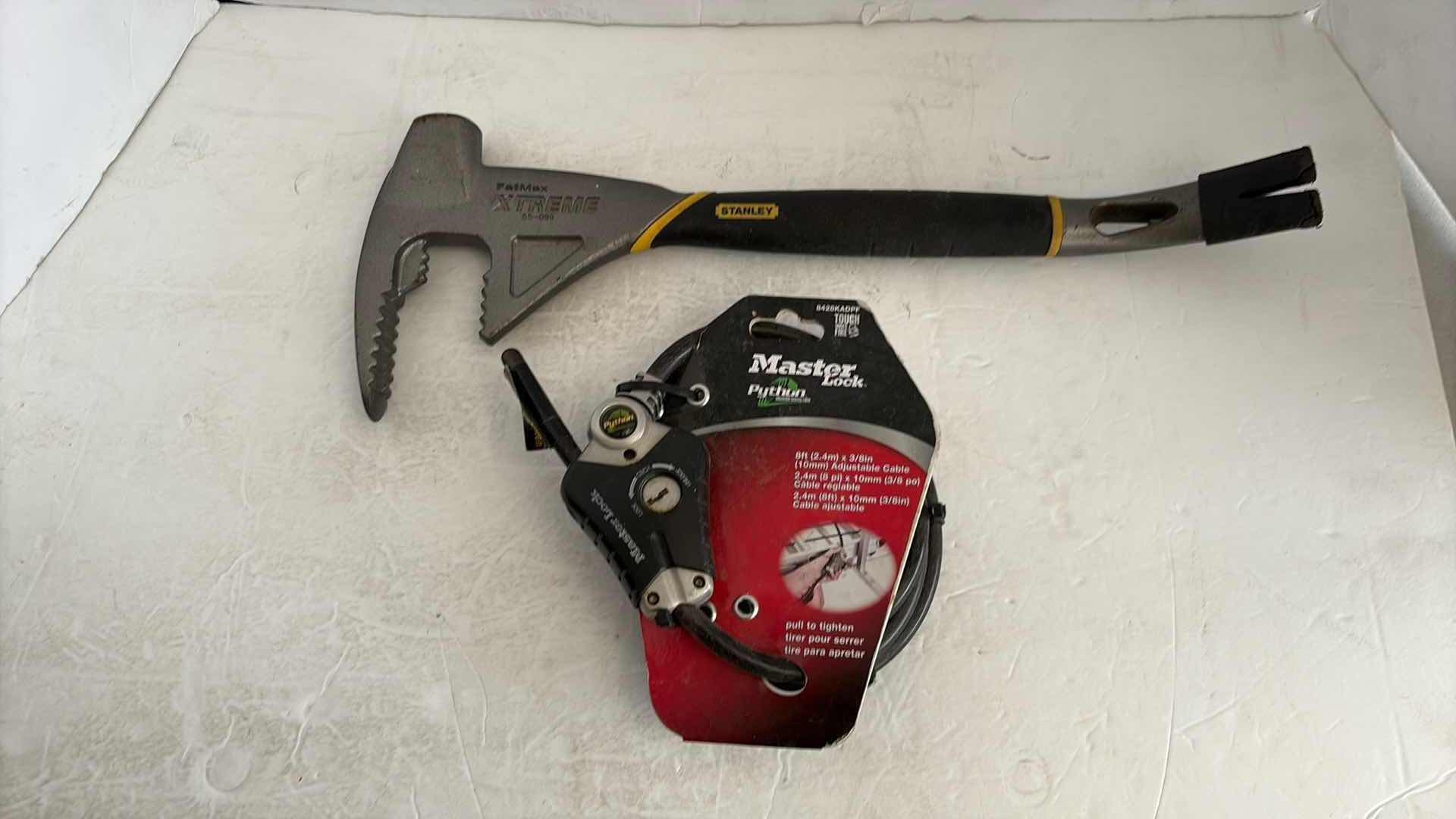 Photo 1 of MASTERLOCK PYTHON LOCK AND STANLEY FATMAX EXTREME CROWBAR