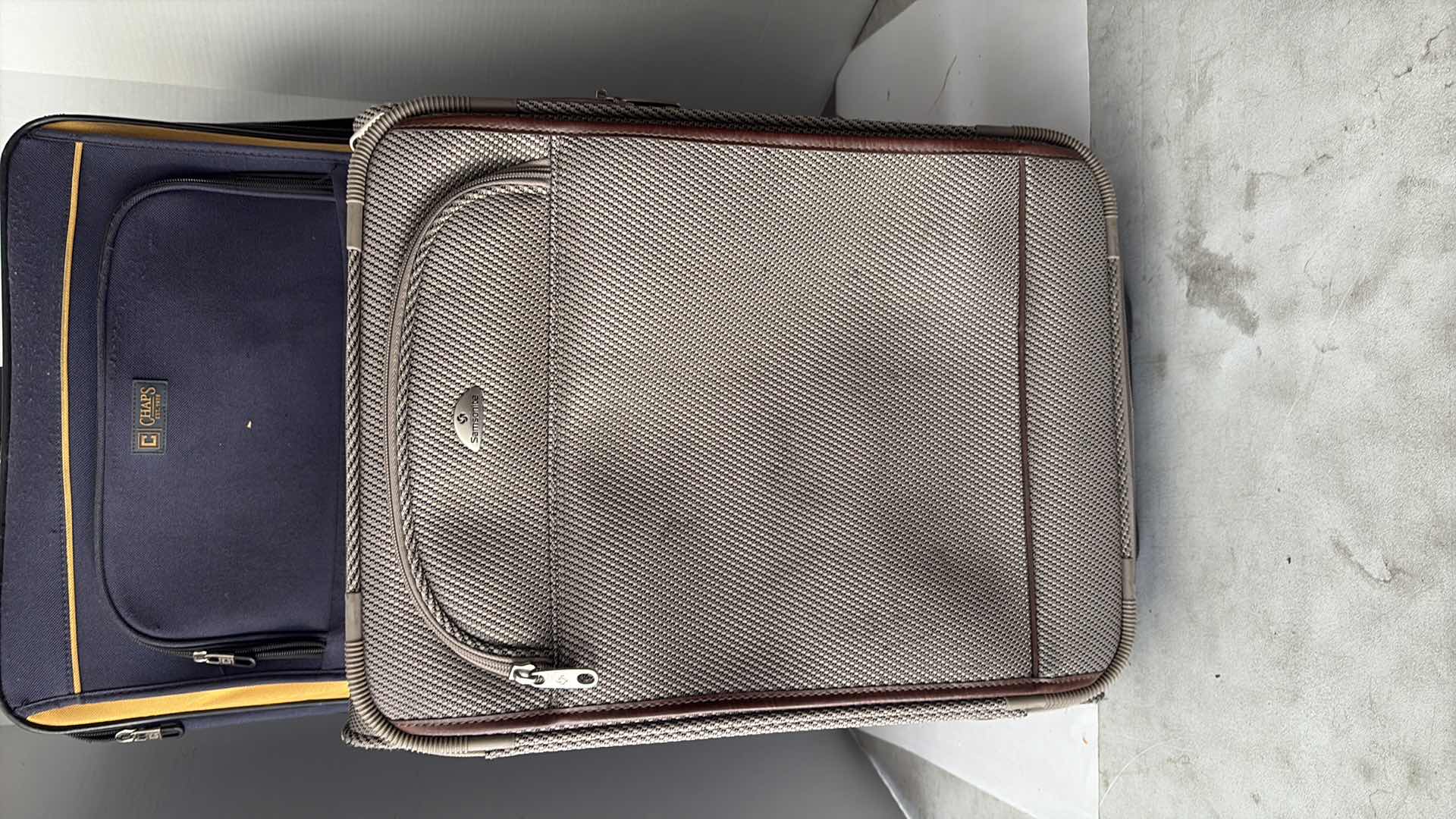 Photo 1 of 2 PIECE ROLLING SUITCASE CHAPS AND SAMSONITE 22”, 28”