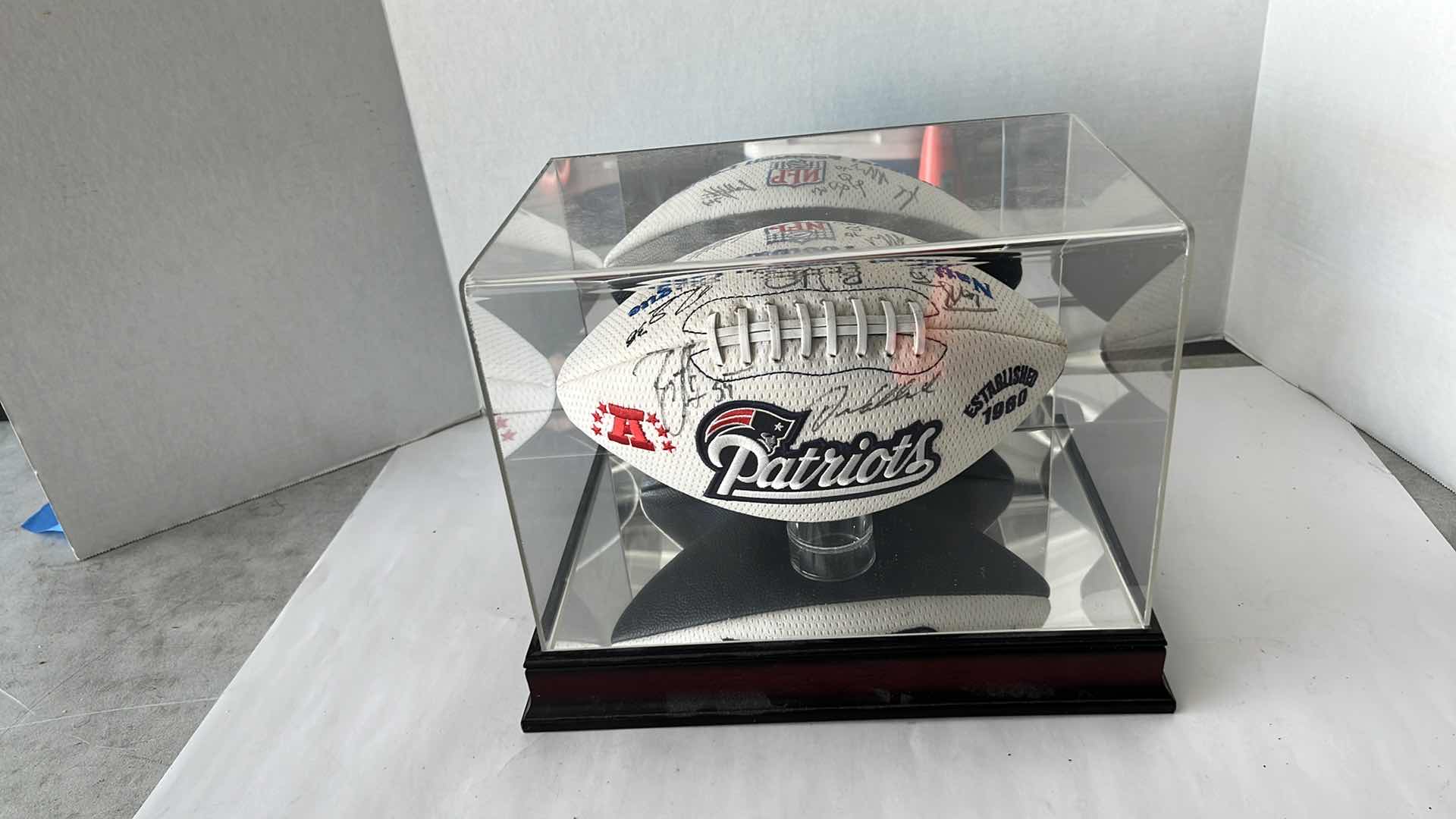 Photo 1 of AUTOGRAPHED NEW ENGLAND PATRIOTS NFL FOOTBALL IN PLASTIC CASE WITH MIRRORED BACK