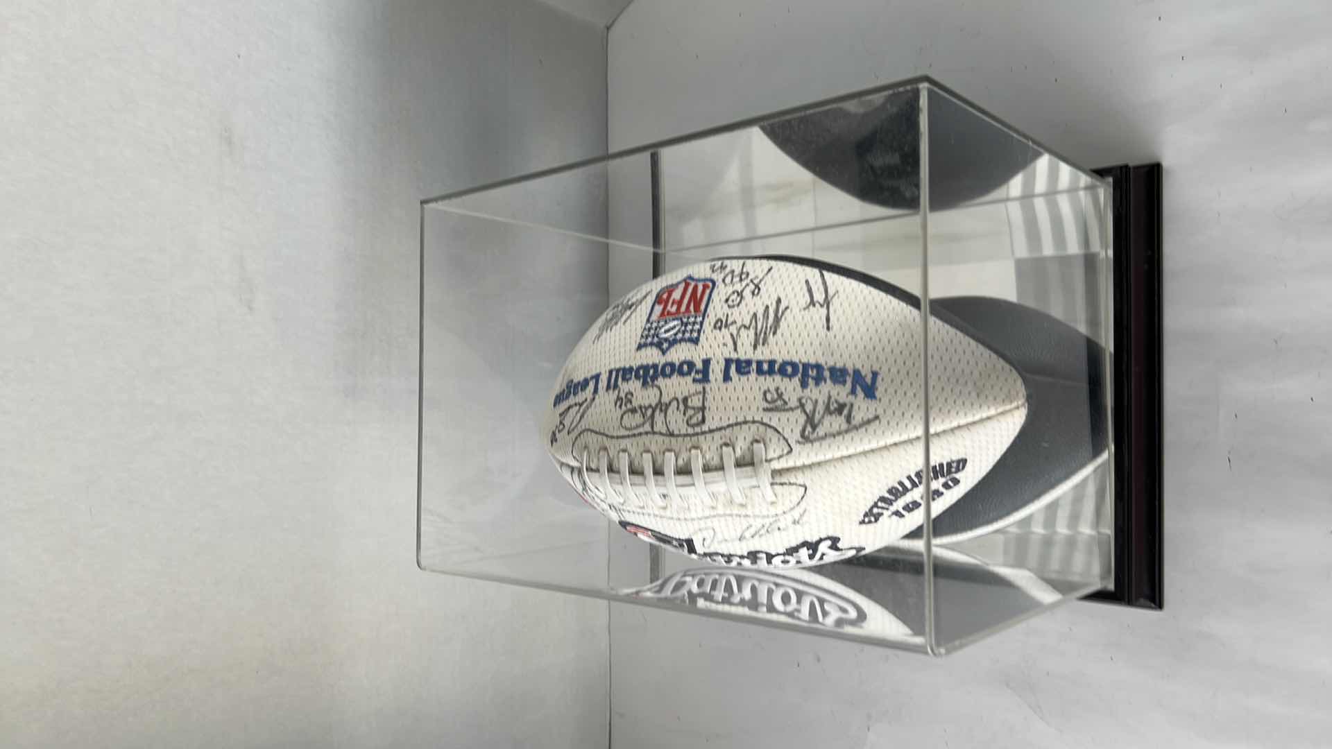 Photo 1 of AUTOGRAPHED NEW ENGLAND PATRIOTS NFL FOOTBALL IN PLASTIC CASE WITH MIRRORED BACK