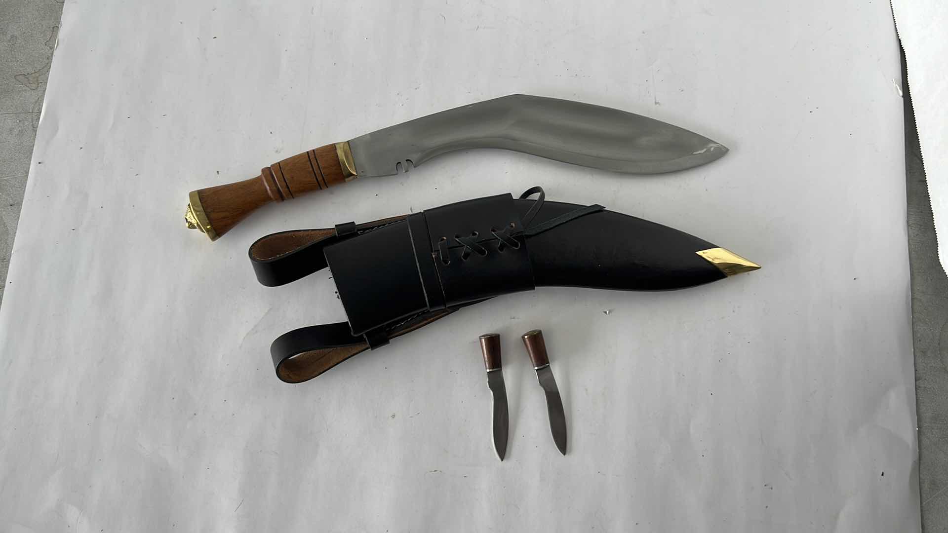 Photo 1 of OFFICE KUKRIS 12” BLADE KNIFE WITH 2 SMALLER KNIVES AND LEATHER SHEATH
