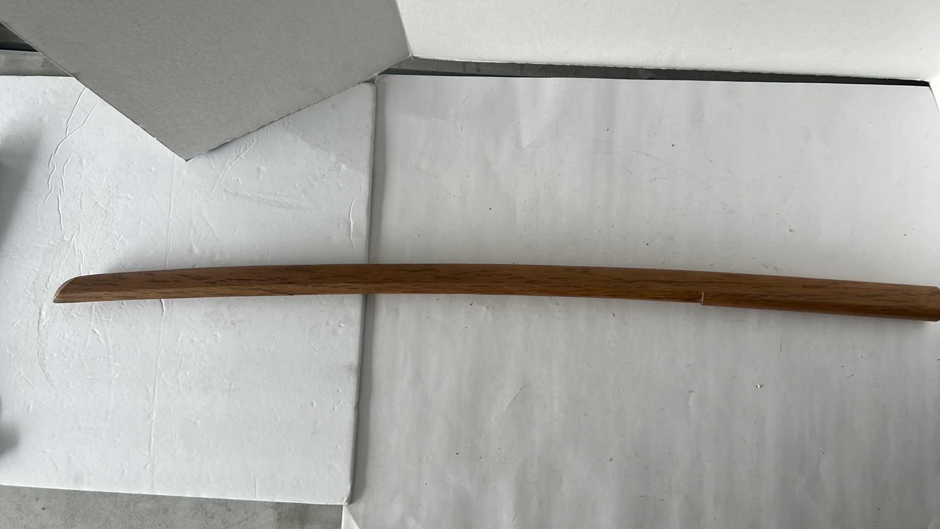 Photo 1 of BOKKEN JAPANESE TRAINING WEAPONS SET. INCLUDES 3 SWORDS AND HOLDERS. $200