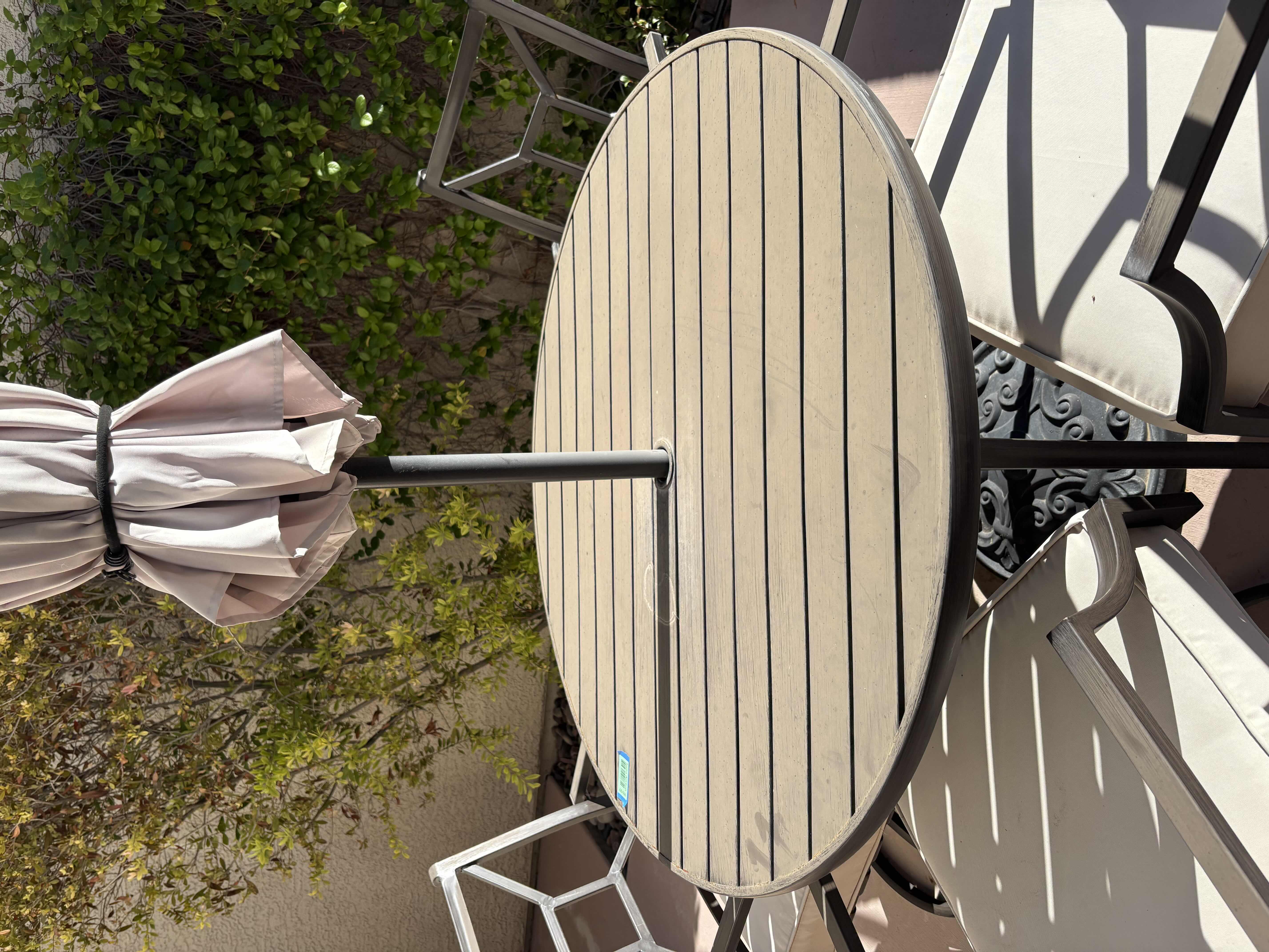 Photo 1 of 42” OUTDOOR TABLE AND CHAIRS H23.5” EST VALUE $490