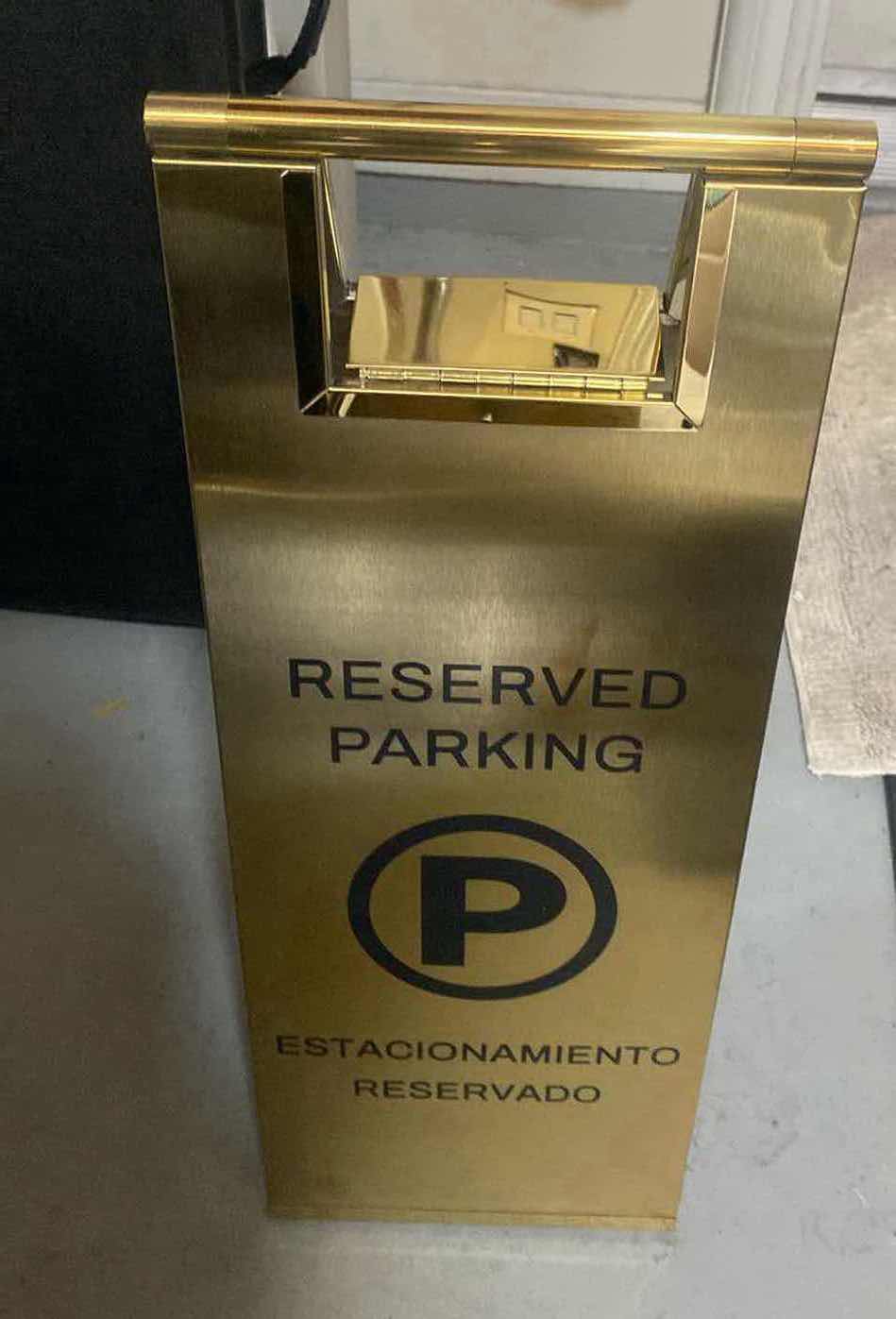 Photo 1 of FOLDABLE GOLD HEAVY ALUMINUM RESERVED PARKING BILINGUAL SIGN 8 3/4“ x 23“ (2 AVAILABLE EACH SOLD SEPARATELY)