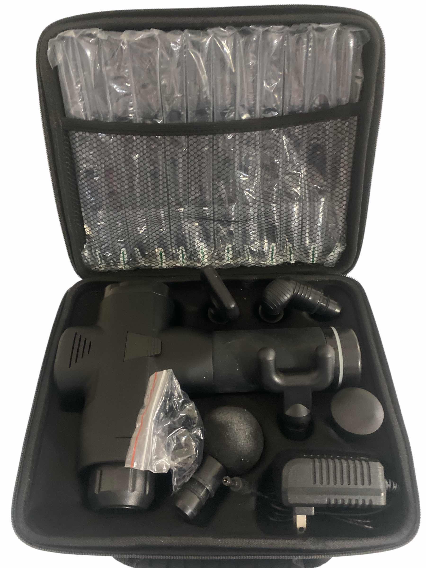 Photo 1 of NEW MASSAGE GUN WITH CASE