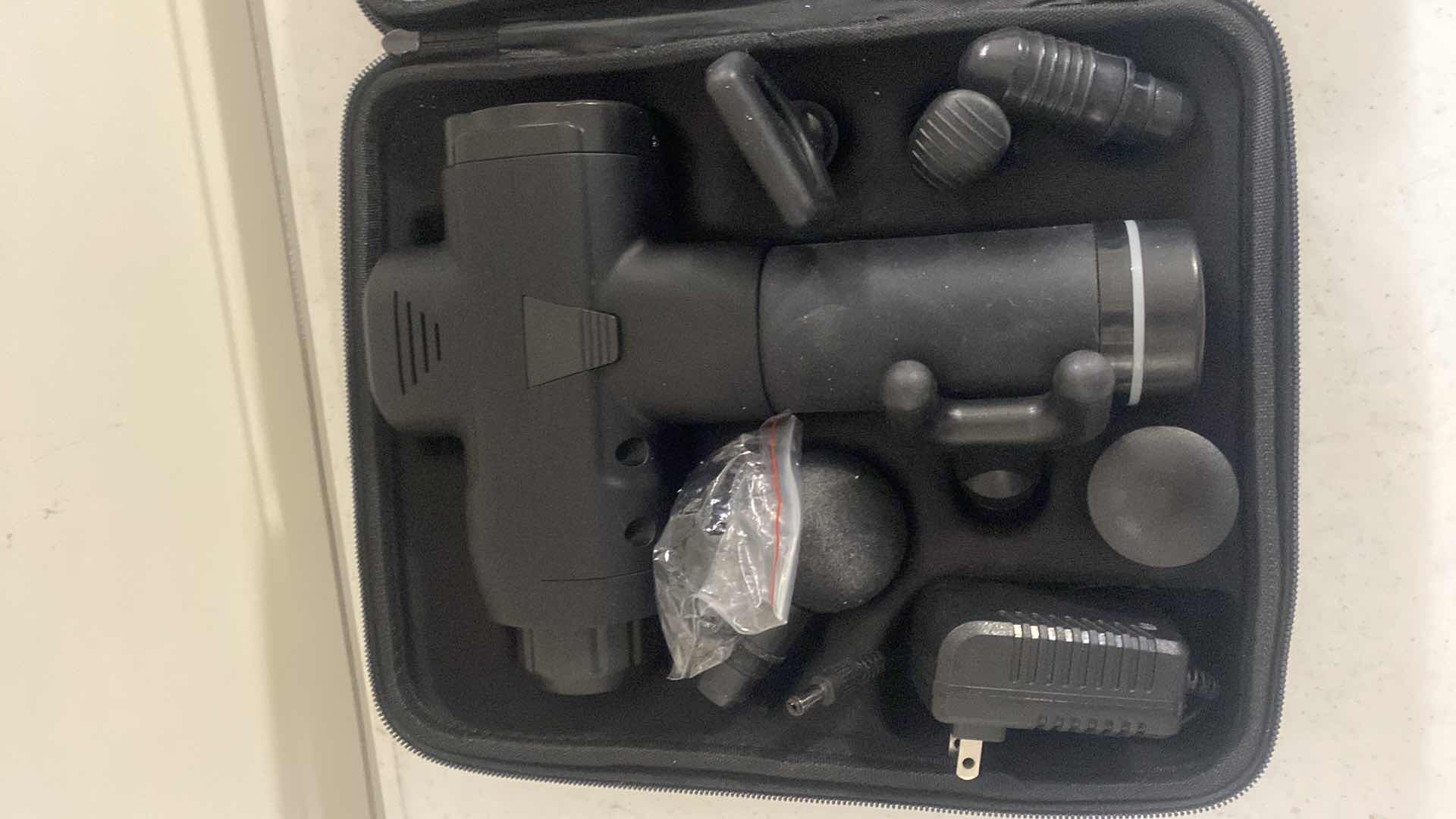 Photo 1 of NEW MASSAGE GUN WITH CASE