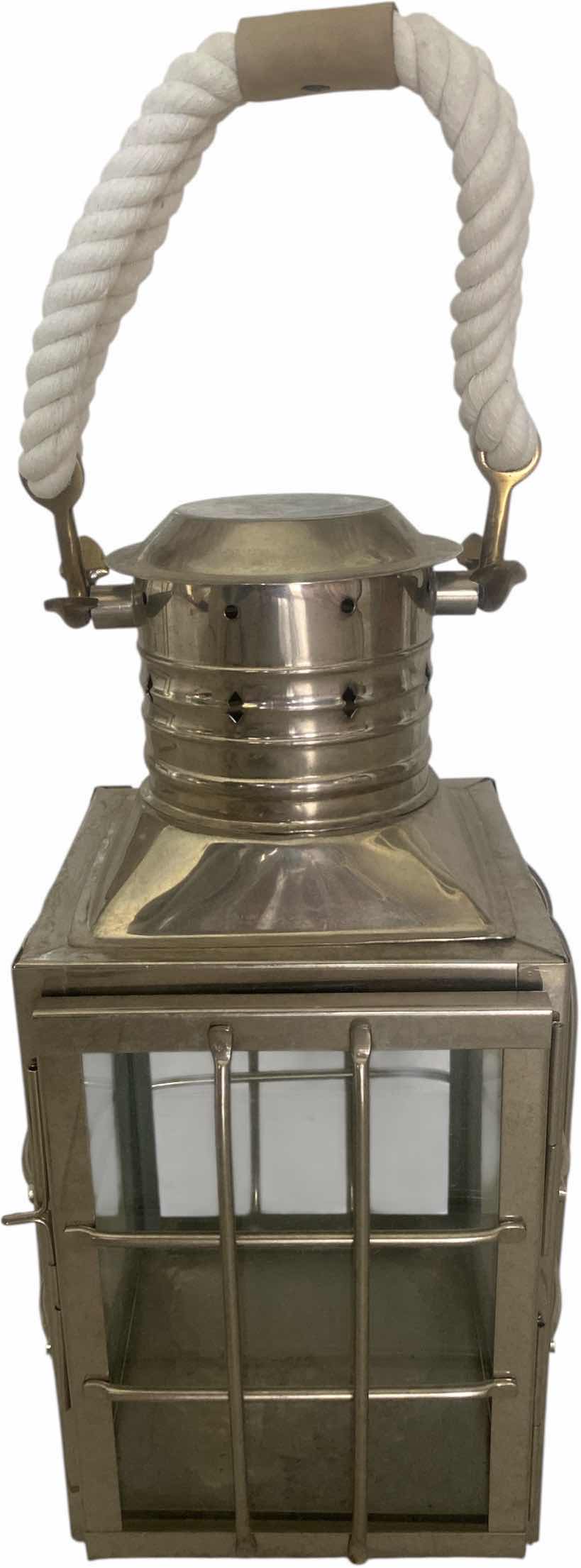 Photo 1 of ADMIRAL COVE HEAVY METAL & GLASS POLISHED CHROME LANTERN WITH ROPE TO HANG OR USE TABLE TOP 9” X 23 1/2”