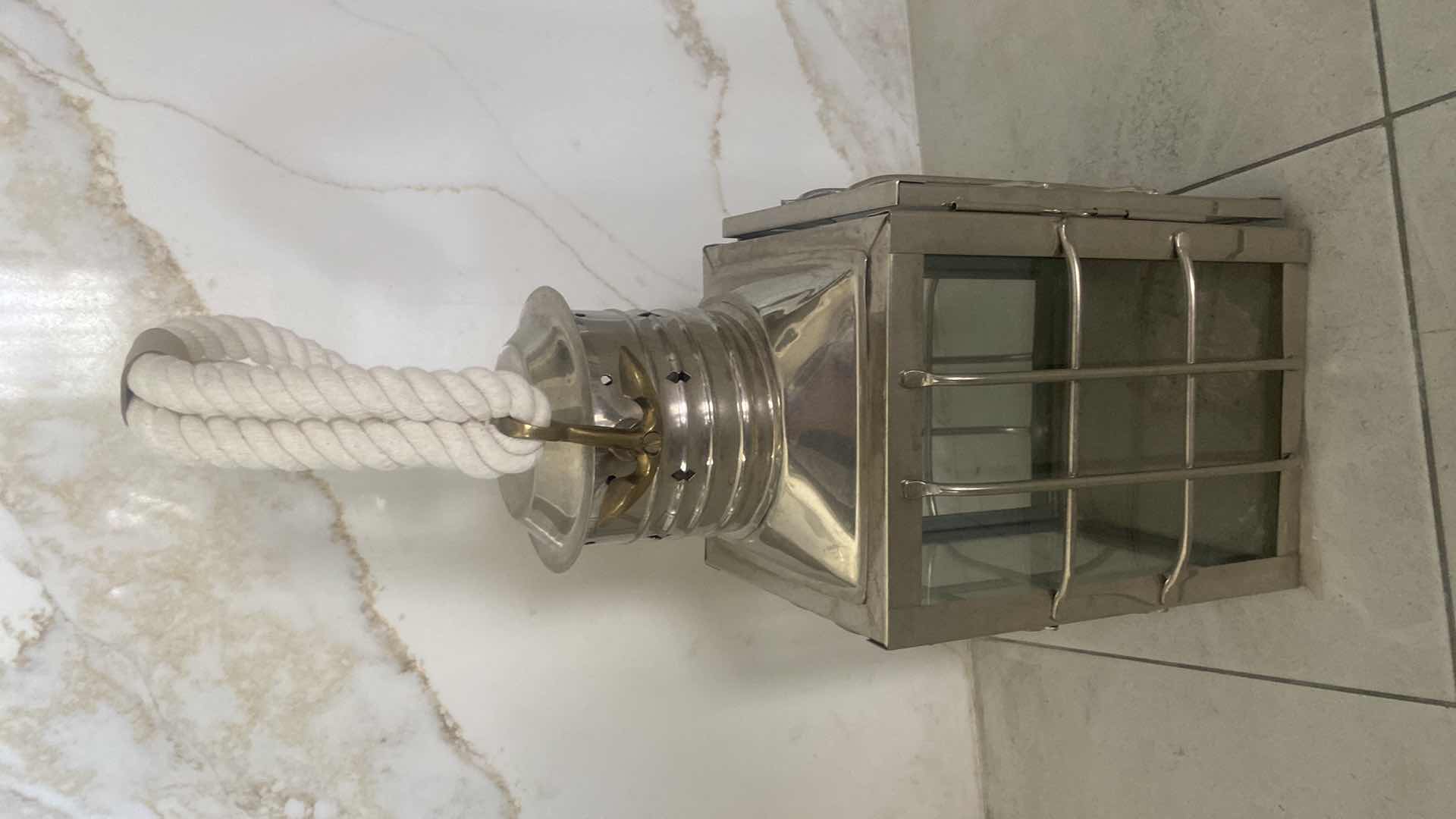 Photo 1 of ADMIRAL COVE HEAVY METAL & GLASS POLISHED CHROME LANTERN WITH ROPE TO HANG OR USE TABLE TOP 9” X 23 1/2”