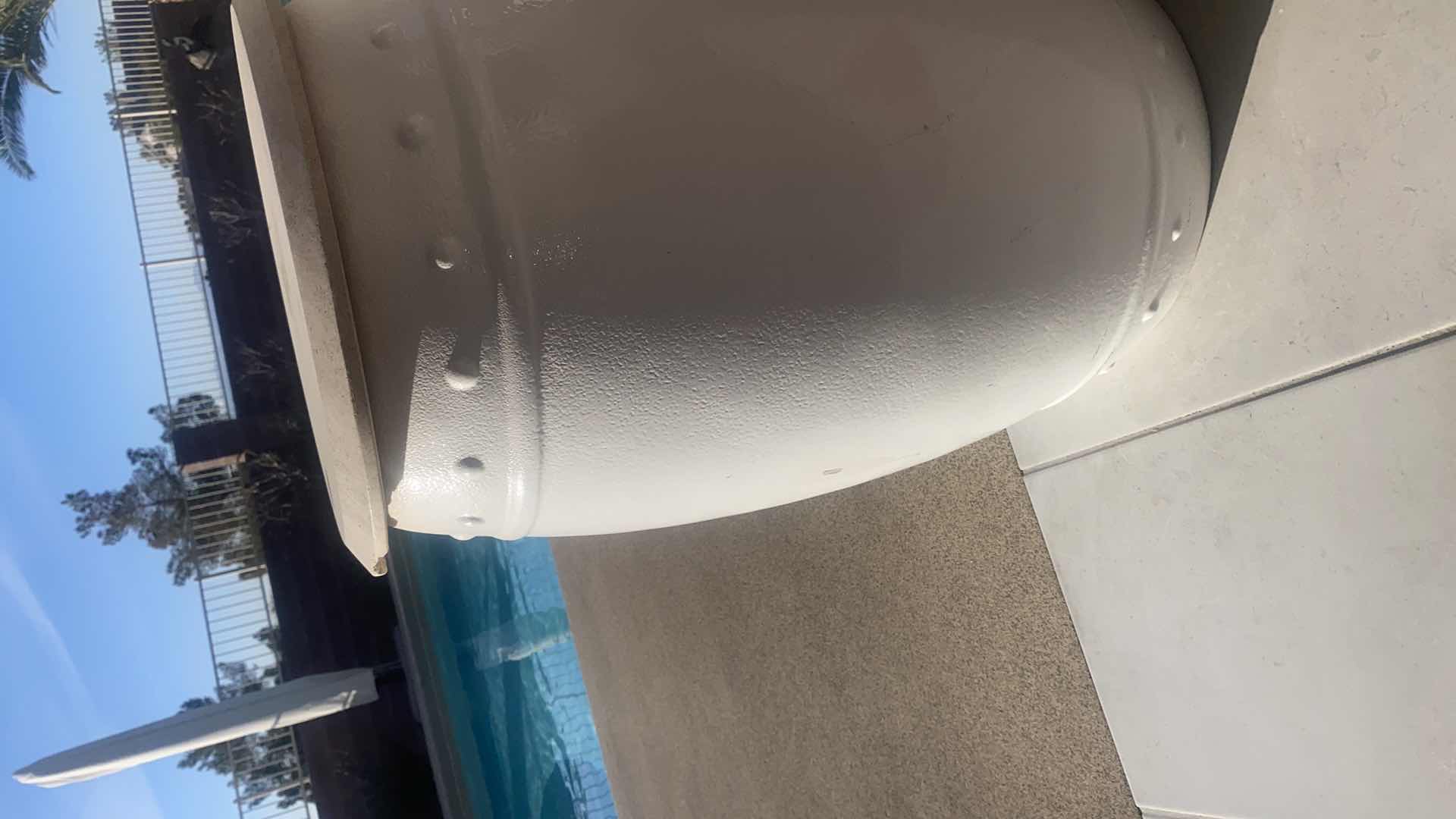 Photo 1 of ROUND OUTDOOR HEAVY END TABLE WITH STONE TOP FROM WYNN LAS VEGAS (2 AVAILABLE EACH SOLD SEPARATELY) 14 1/2” x 23”