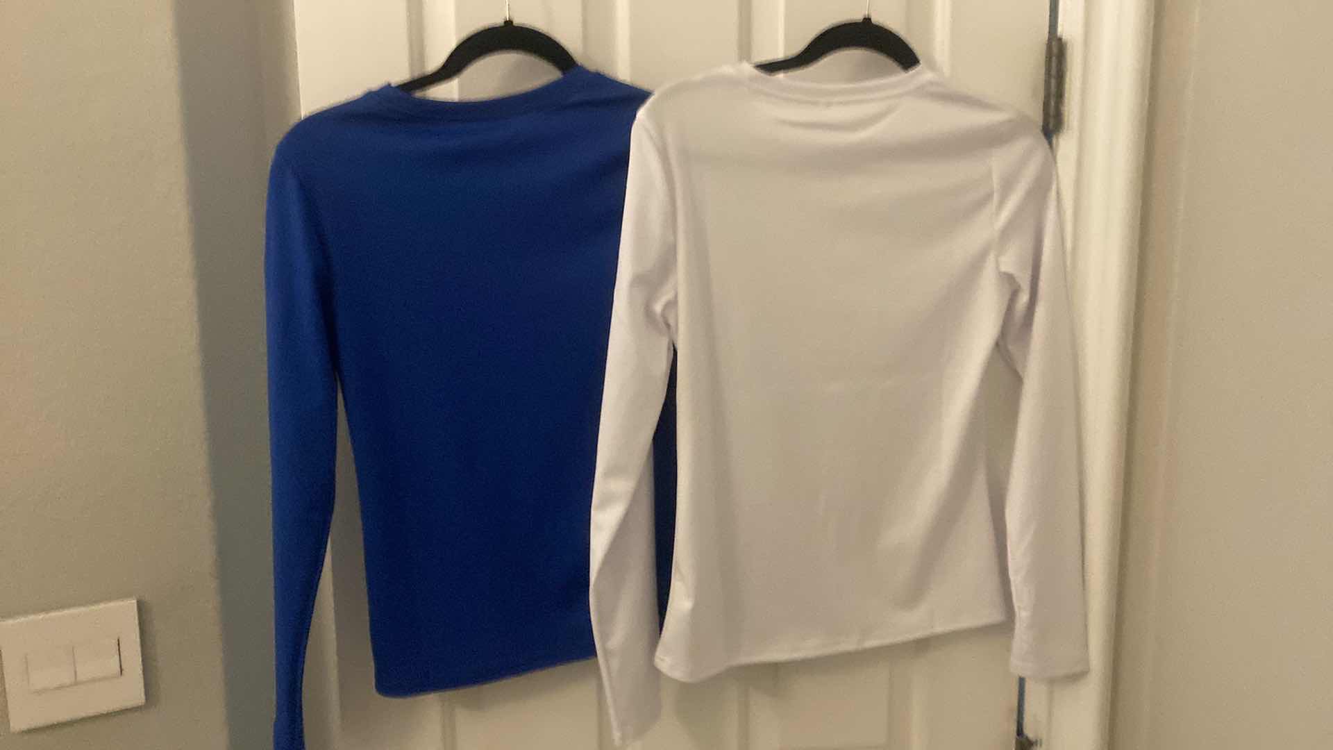 Photo 1 of NEW WOMEN’s MUSIC LONG  SLEEVE TEES SIZE SMALL & MEDIUM