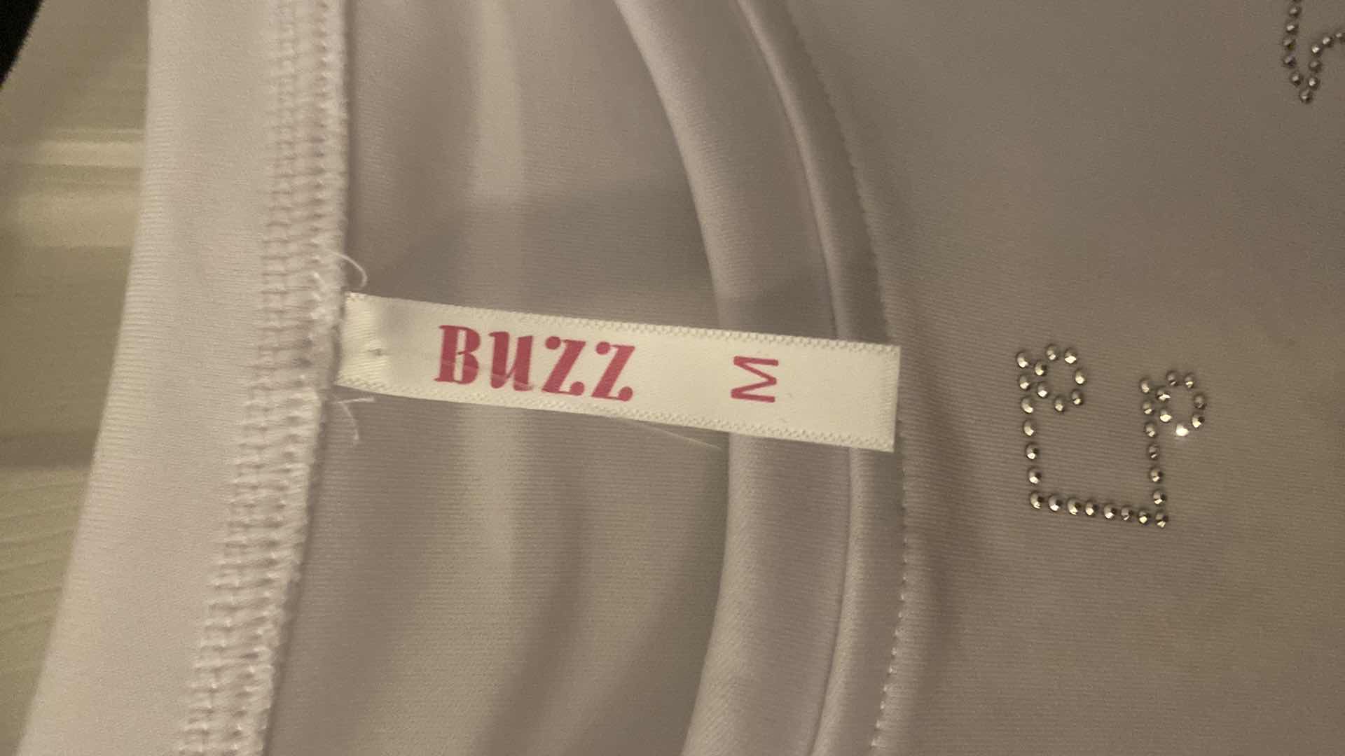 Photo 1 of NEW WOMEN’s MUSIC LONG  SLEEVE TEES SIZE SMALL & MEDIUM