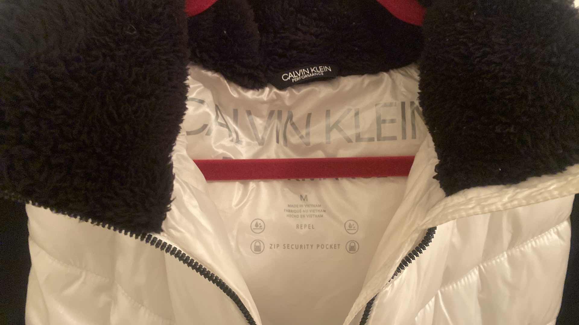 Photo 1 of WOMENS CALVIN KLEIN PUFFY PERFORMANCE JACKET WITH HOOD SIZE MEDIUM