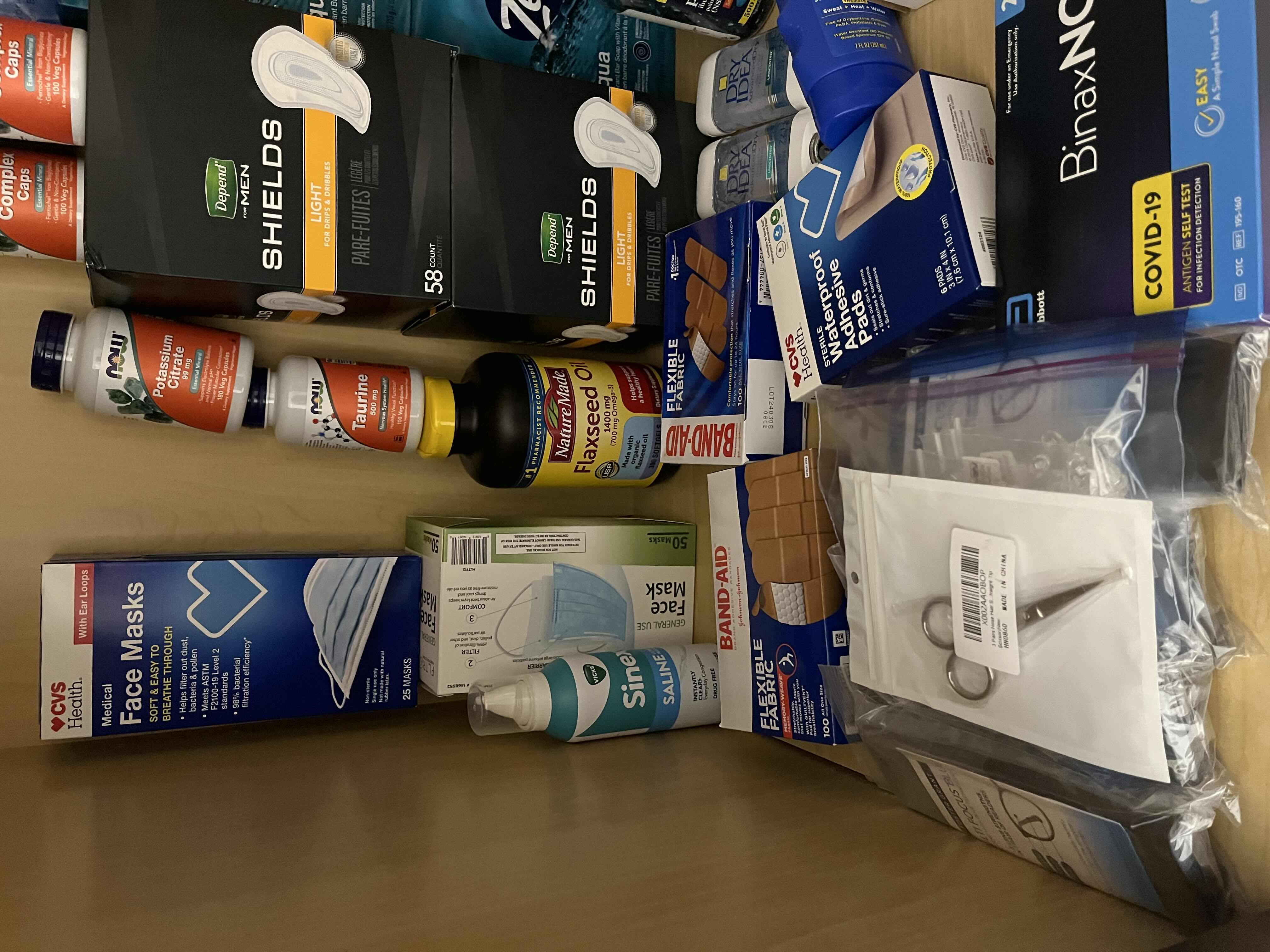 Photo 1 of NEW CONTENTS OF CABINET-HYGIENE PRODUCTS, FIRST AID, SUPPLEMENTS