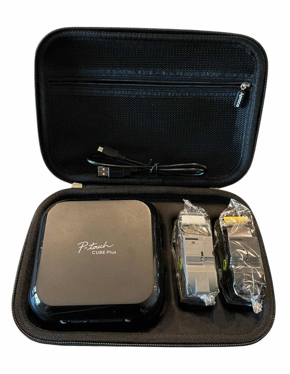 Photo 1 of BOTHER P-TOUCH CUBE PLUS LABEL MAKER PTP710BT W 2 NEW LABEL CARTRIDGES & APROCA HARD CASE