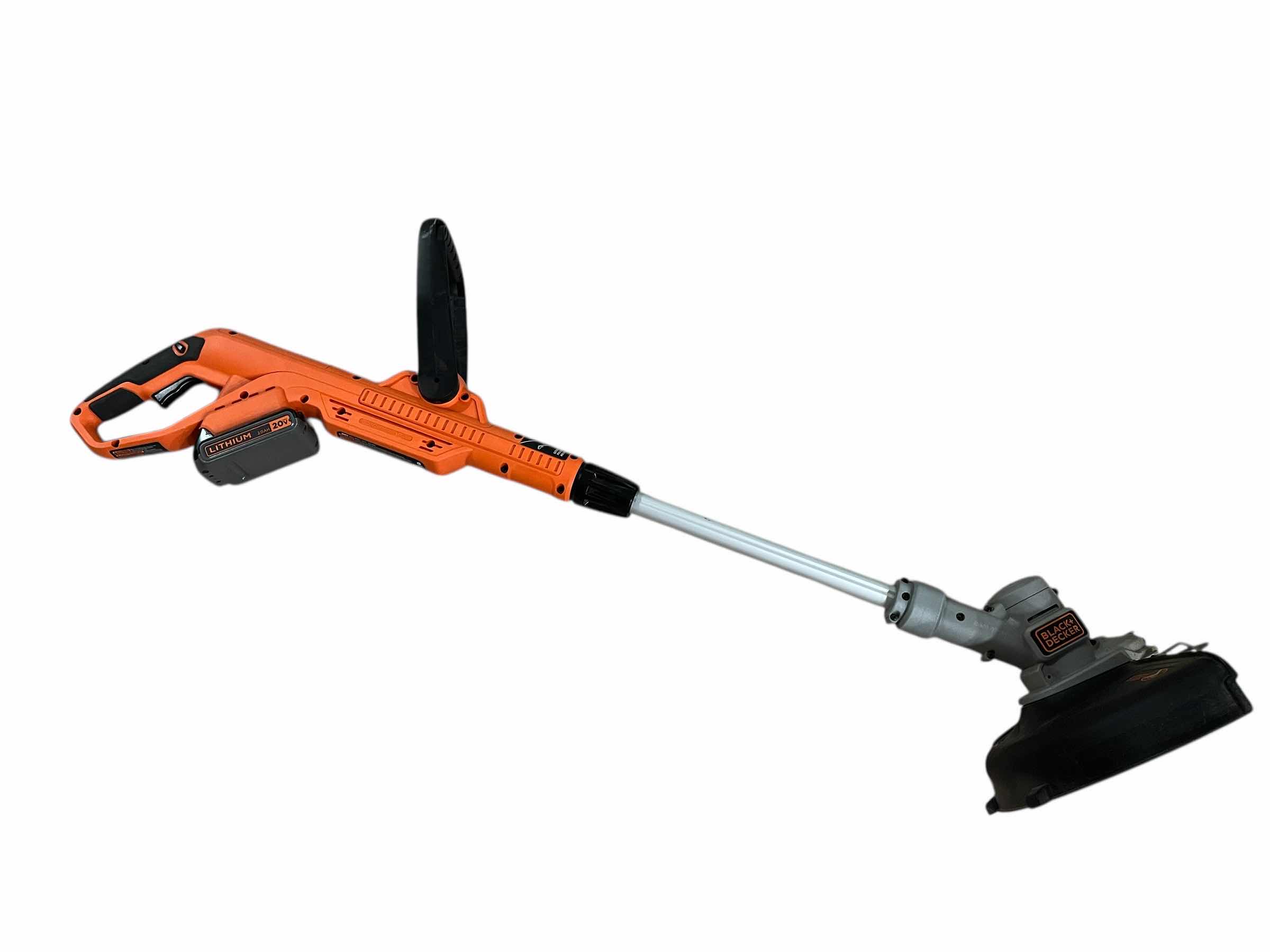 Photo 1 of BLACK & DECKER 20VOLT STRING TRIMMER/LAWN EDGER LST300 W 20VOLT BATTERY