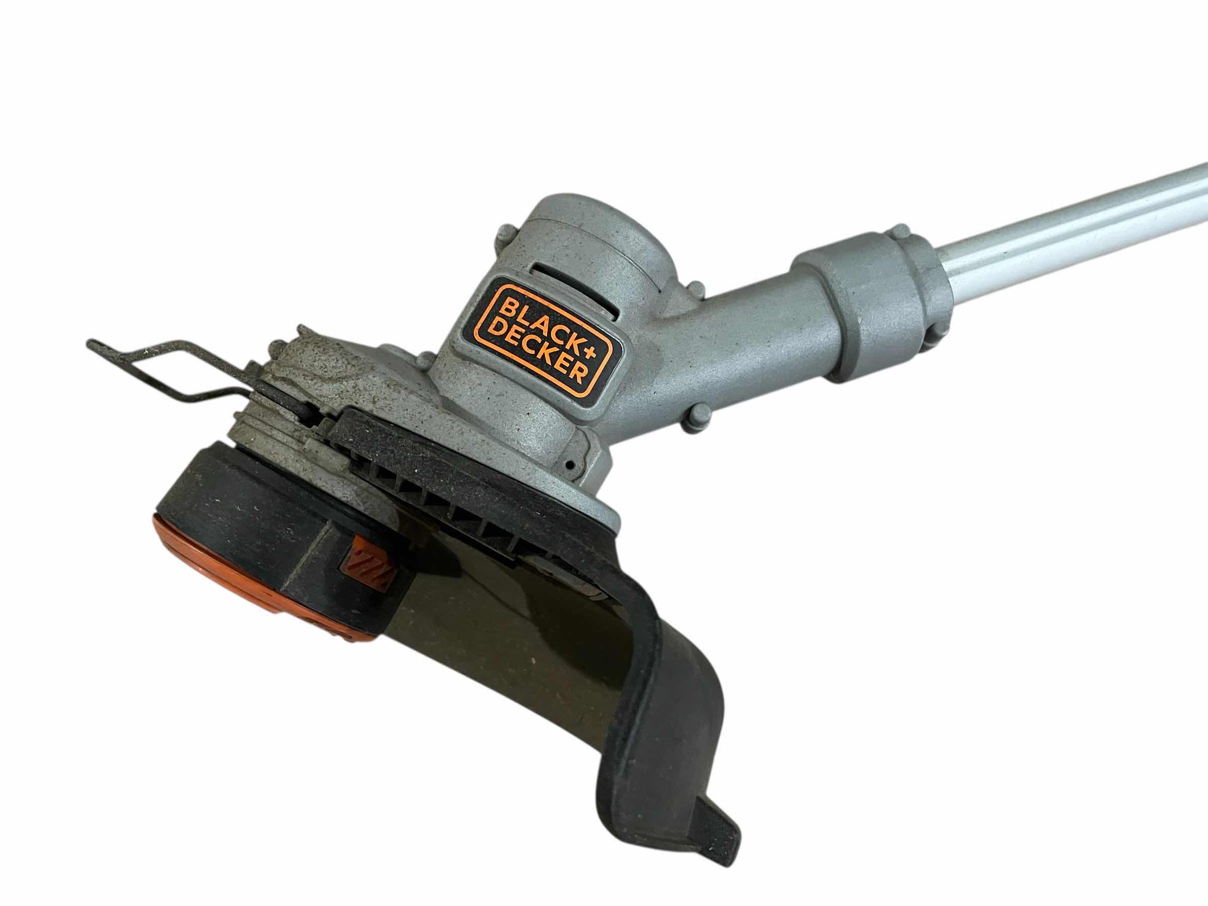 Photo 1 of BLACK & DECKER 20VOLT STRING TRIMMER/LAWN EDGER LST300 W 20VOLT BATTERY