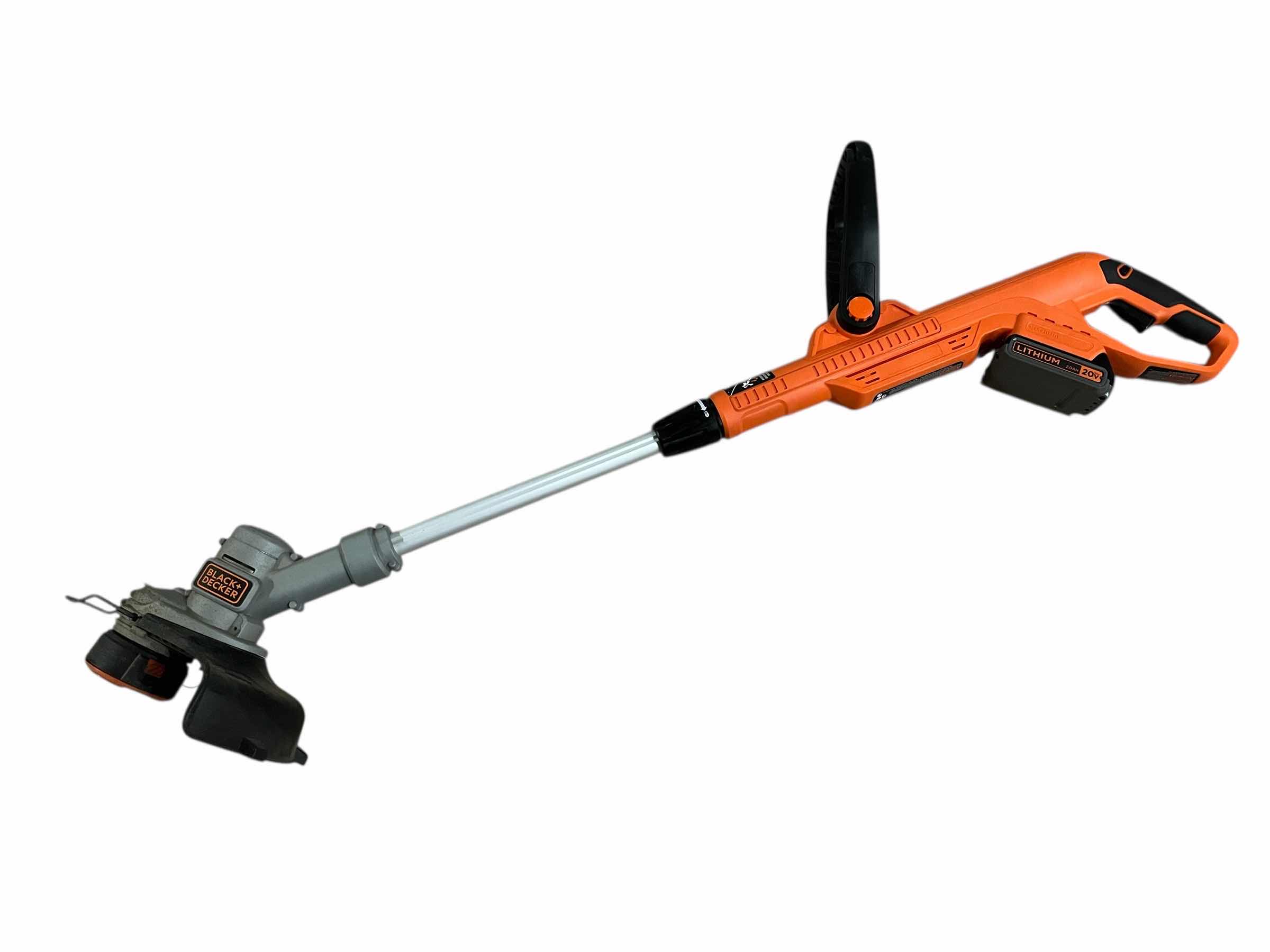 Photo 1 of BLACK & DECKER 20VOLT STRING TRIMMER/LAWN EDGER LST300 W 20VOLT BATTERY