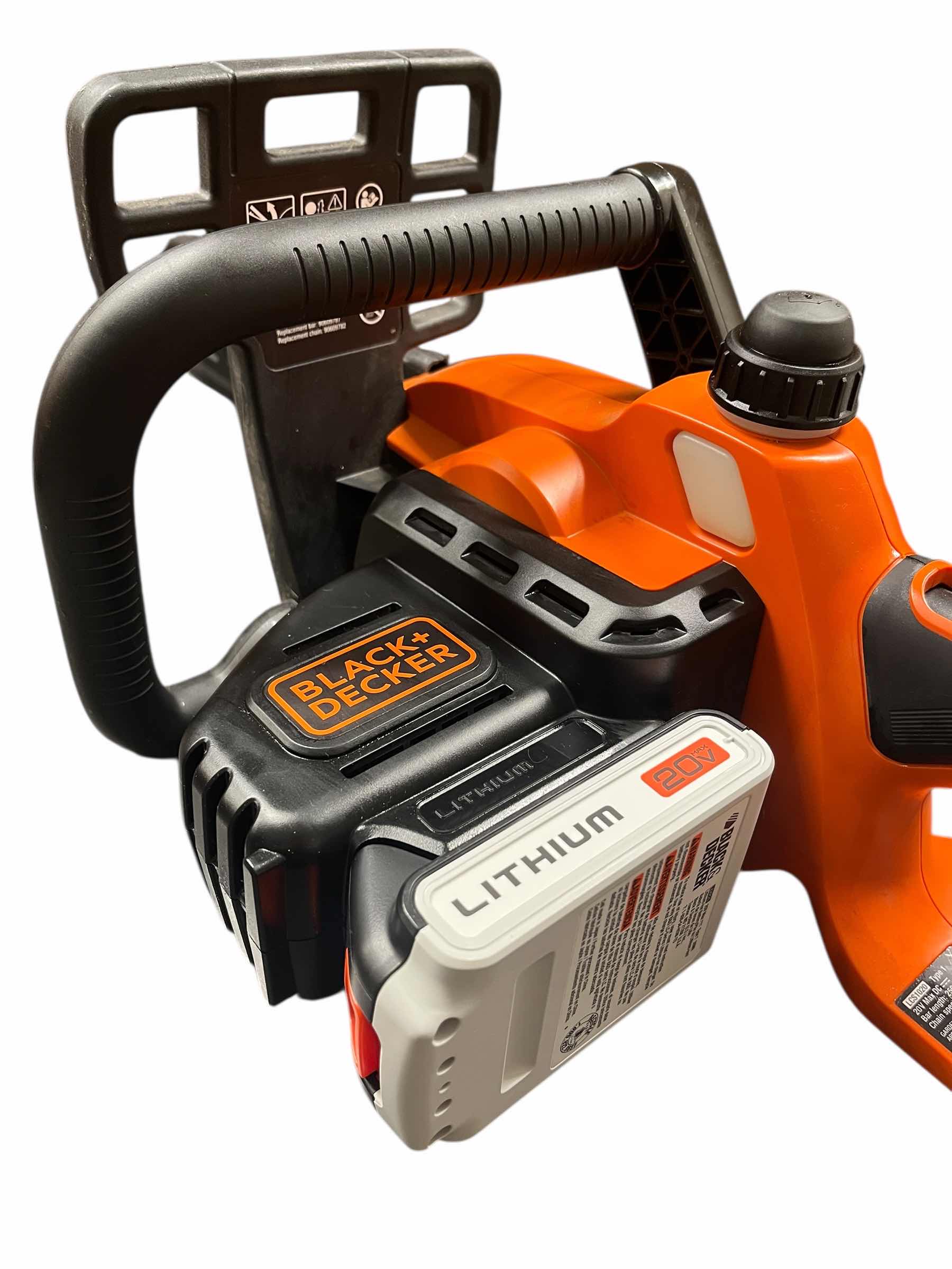 Photo 1 of BLACK & DECKER 10” 20VOLT MAX ELECTRIC CHAINSAW W 20VOLT BATTERY LCS1020