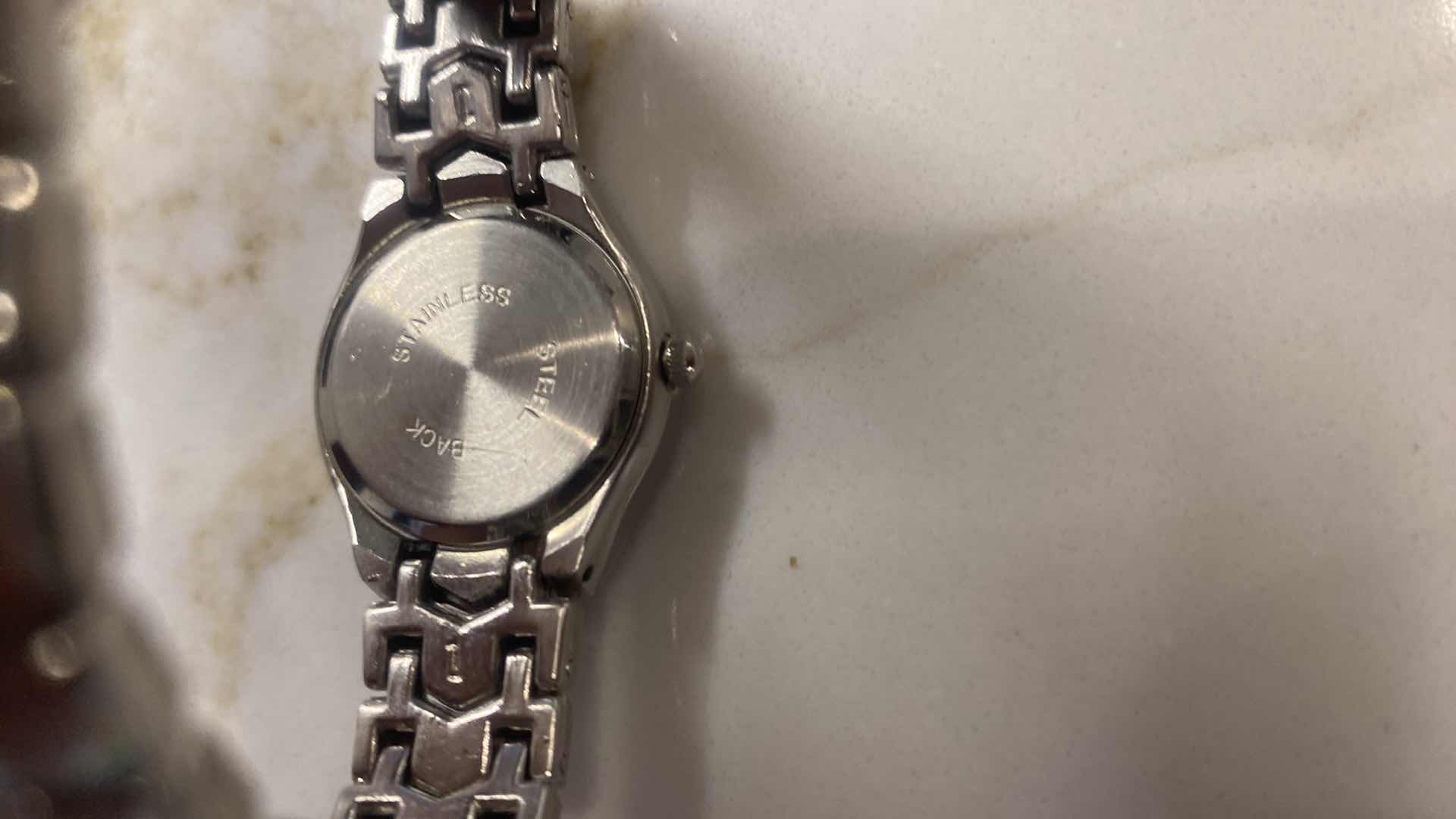Photo 1 of WOMEN’S REPLICA ROLEX WATCH WITH BLACK DIAL STAINLESS STEEL JEWELRY