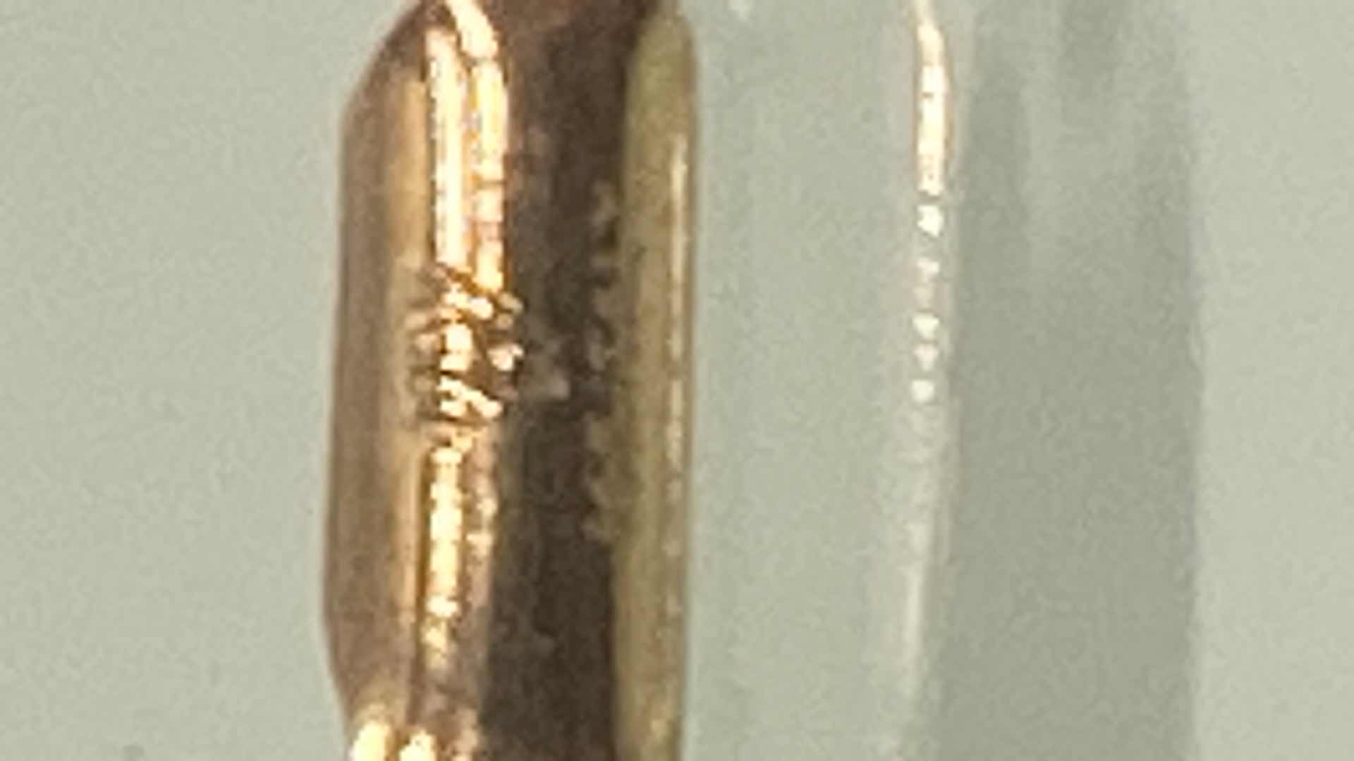 Photo 1 of WOMEN’S10K GOLD STAMPED CHAIN WITH CRUCIFIX PENDANT STAMPED 10K,  1 1/2 INCHES DROP JEWELRY