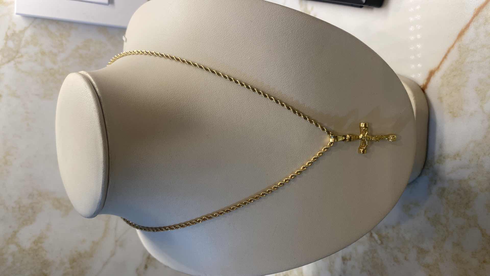 Photo 1 of WOMEN’S10K GOLD STAMPED CHAIN WITH CRUCIFIX PENDANT STAMPED 10K,  1 1/2 INCHES DROP JEWELRY