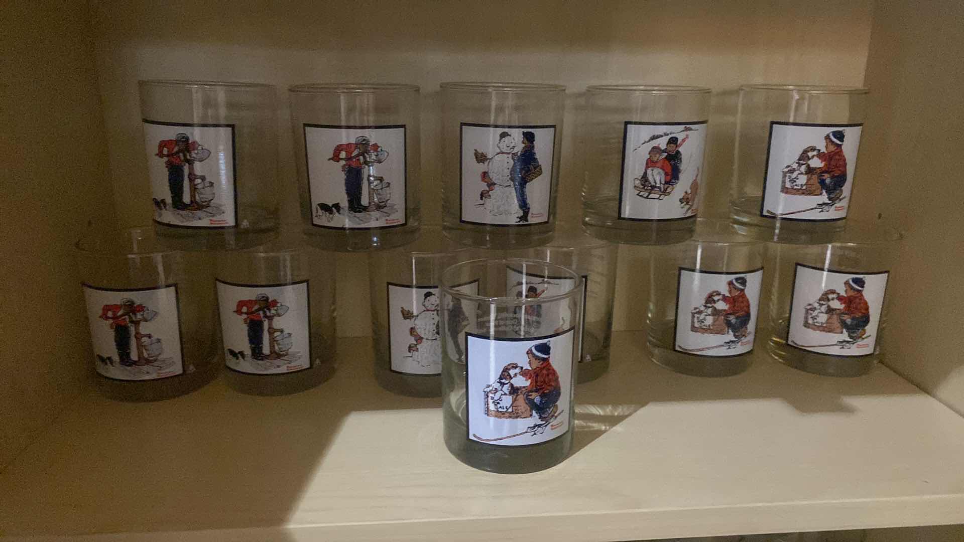 View 2 of SHELF OF VINTAGE PEPSI NORMAN ROCKWELL WINTER SCENE BY ARBY’S COLLECTOR SERIES (12)