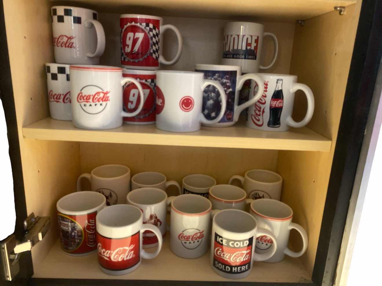 View 1 of 2 - SHELVES OF COCA-COLA COFFEE CUPS (23)