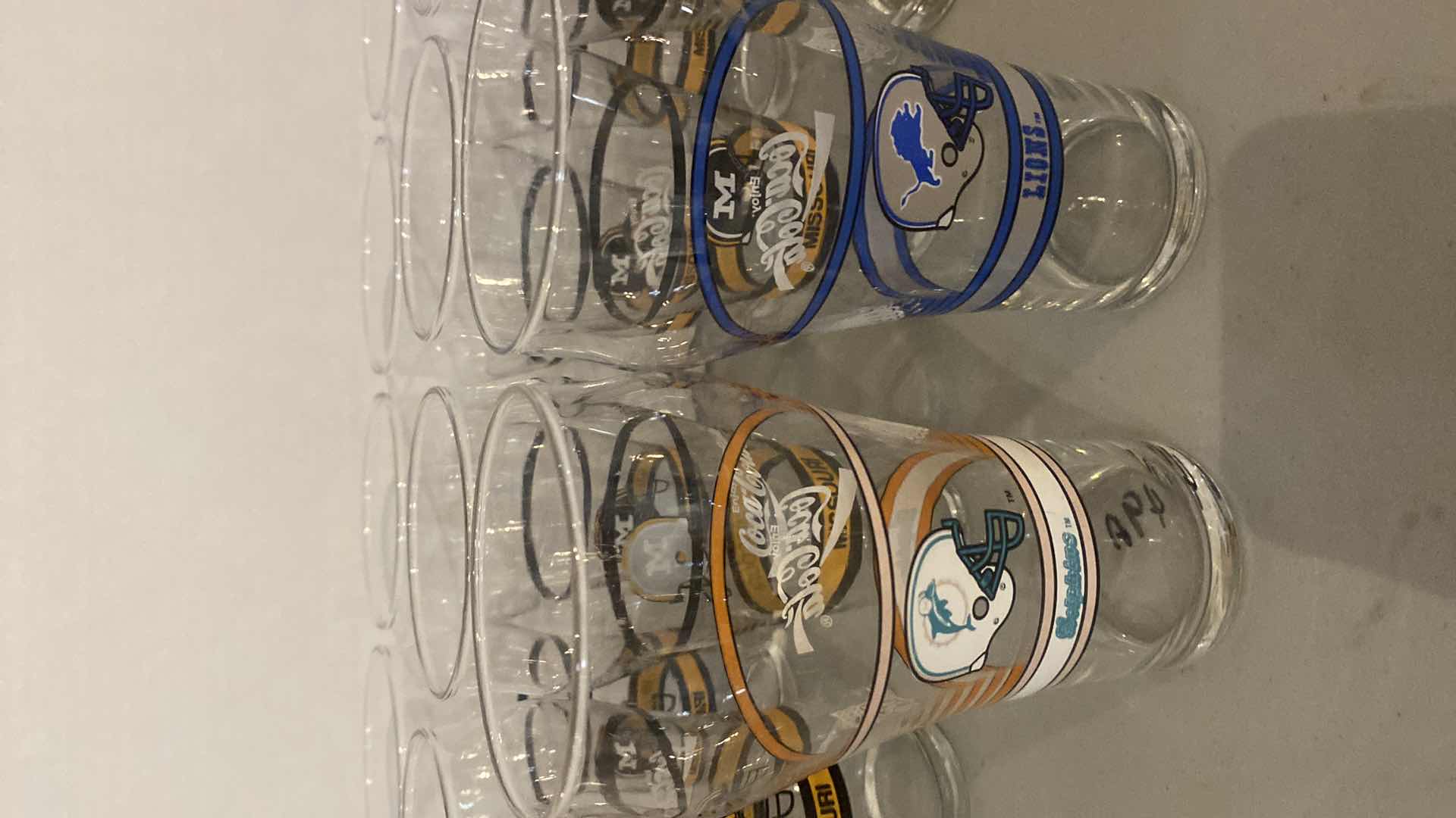 View 3 of VINTAGE COCA-COLA FOOTBALL GLASSES- MISSOURI (12) DOLPHINS AND LIONS (1 EACH) TOTAL (14)